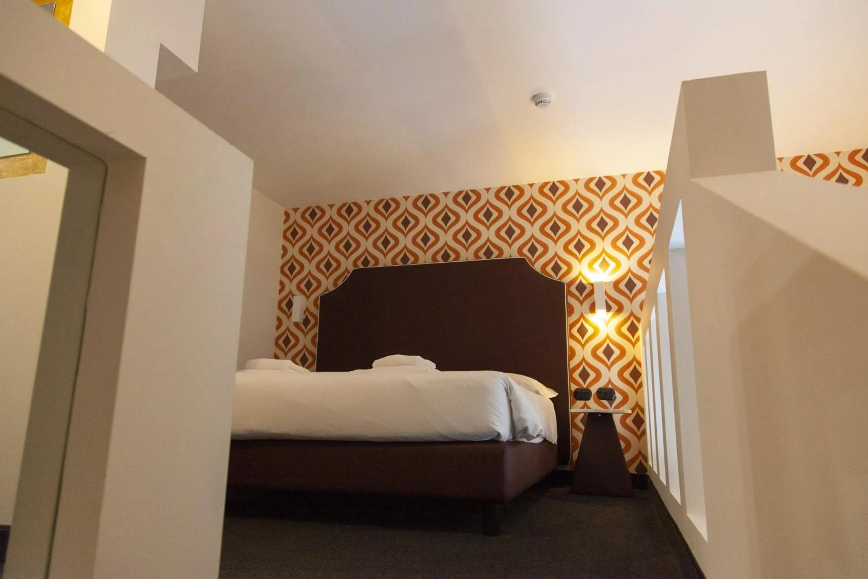 Bedroom, Bed in Hotel Al Campanile - Luxury Suites & Apartments