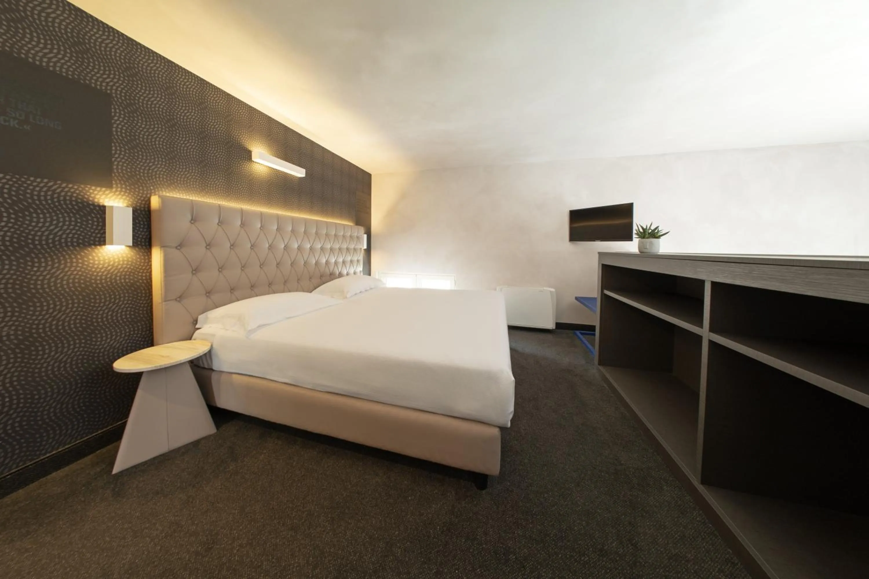 Bedroom, Bed in Hotel Al Campanile - Luxury Suites & Apartments
