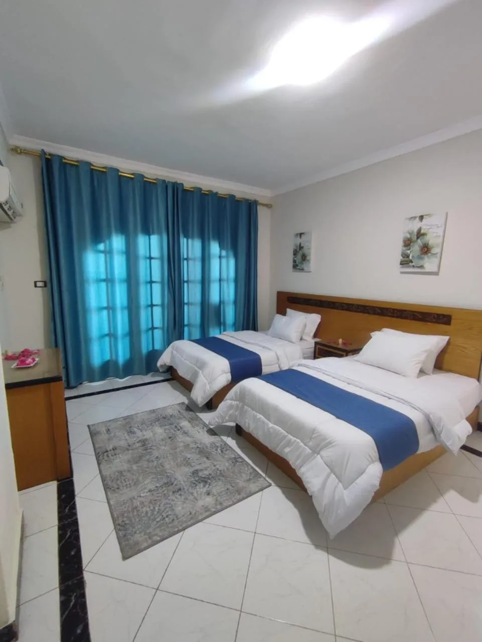 Bed in Ajami Hotel Armed Forces Apartments