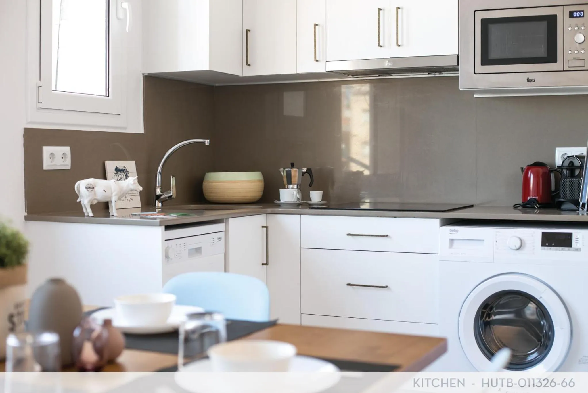 Kitchen or kitchenette in Suite Place Barcelona Còrsega