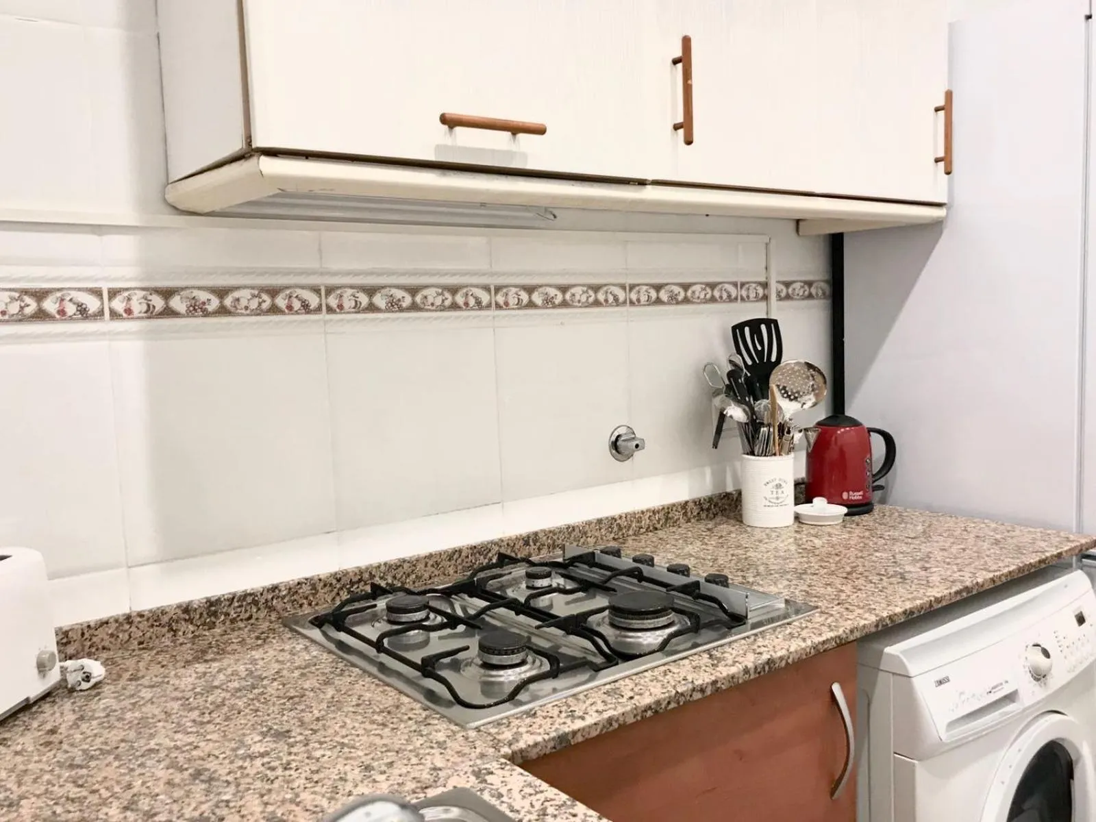 Kitchen or kitchenette in Suite Place Barcelona Còrsega