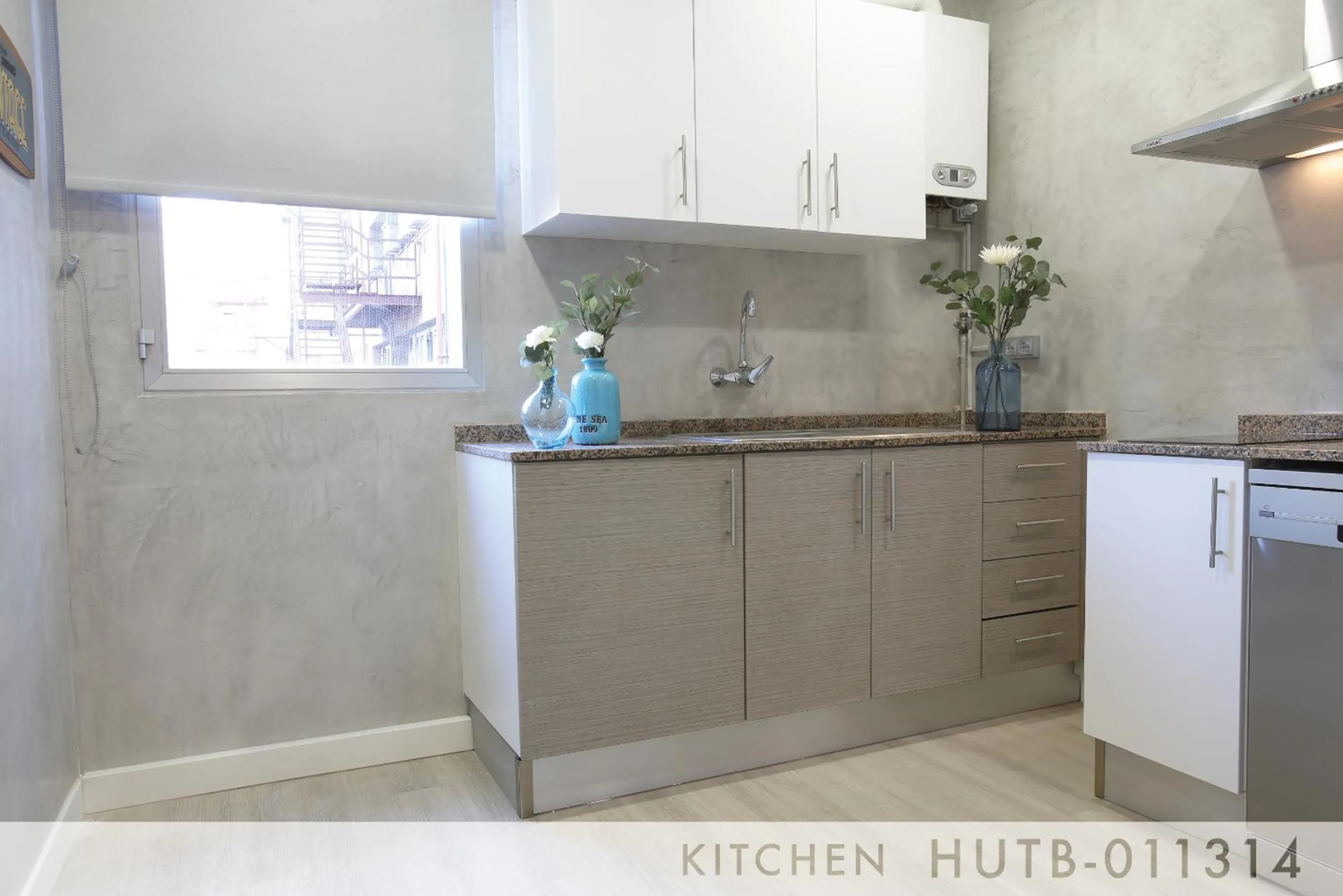 Kitchen or kitchenette in Suite Place Barcelona Còrsega