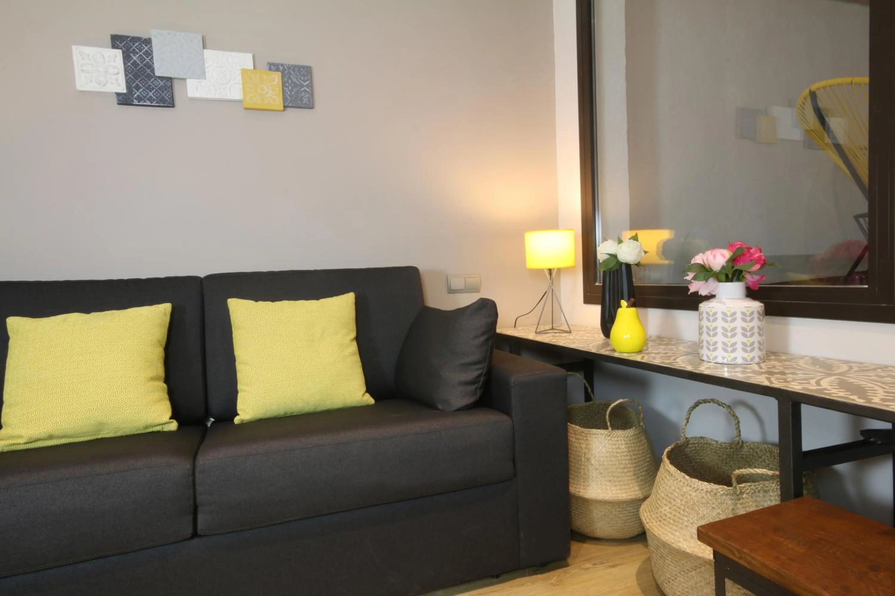 Communal lounge/ TV room in Suite Place Barcelona Còrsega