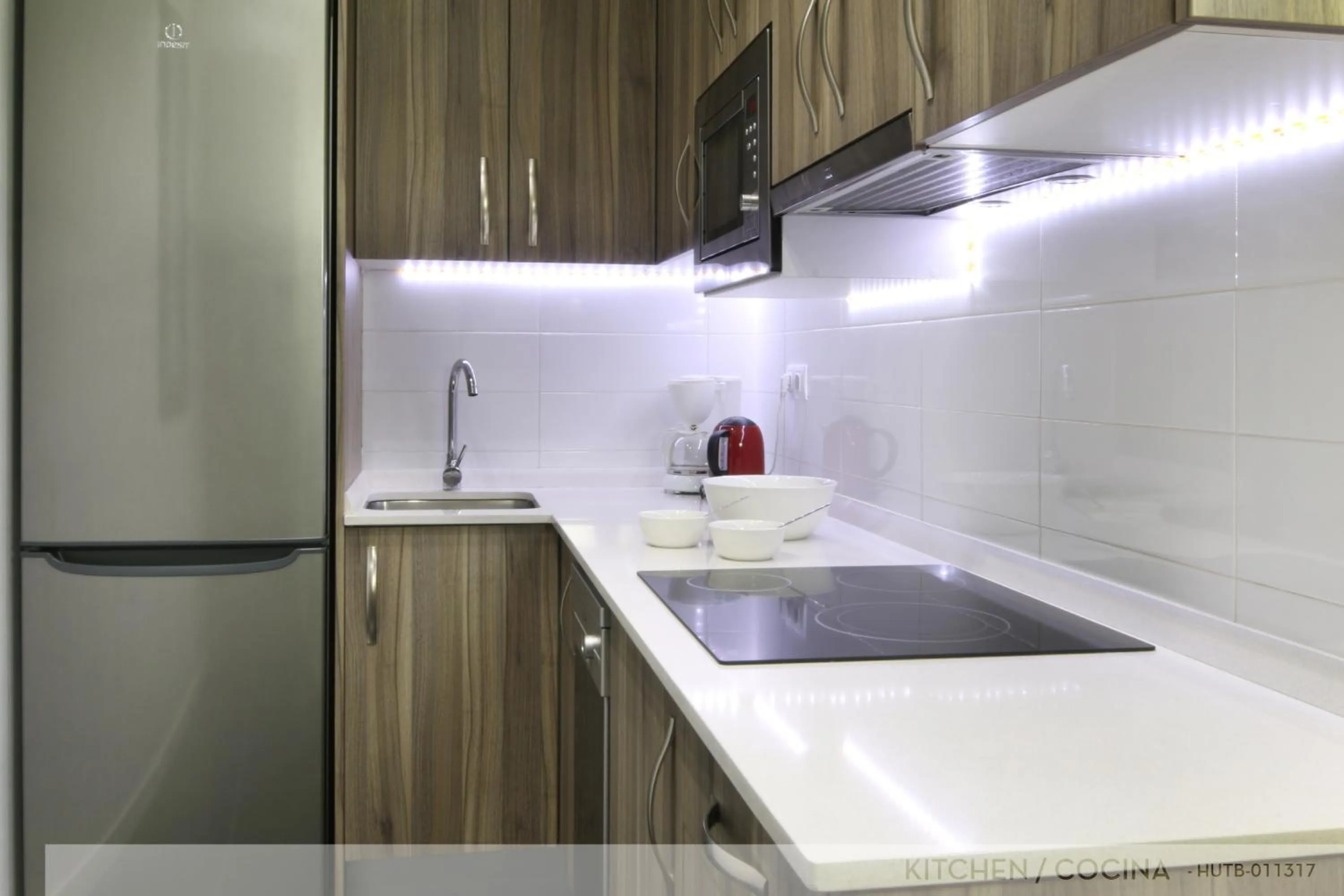 Kitchen or kitchenette in Suite Place Barcelona Còrsega