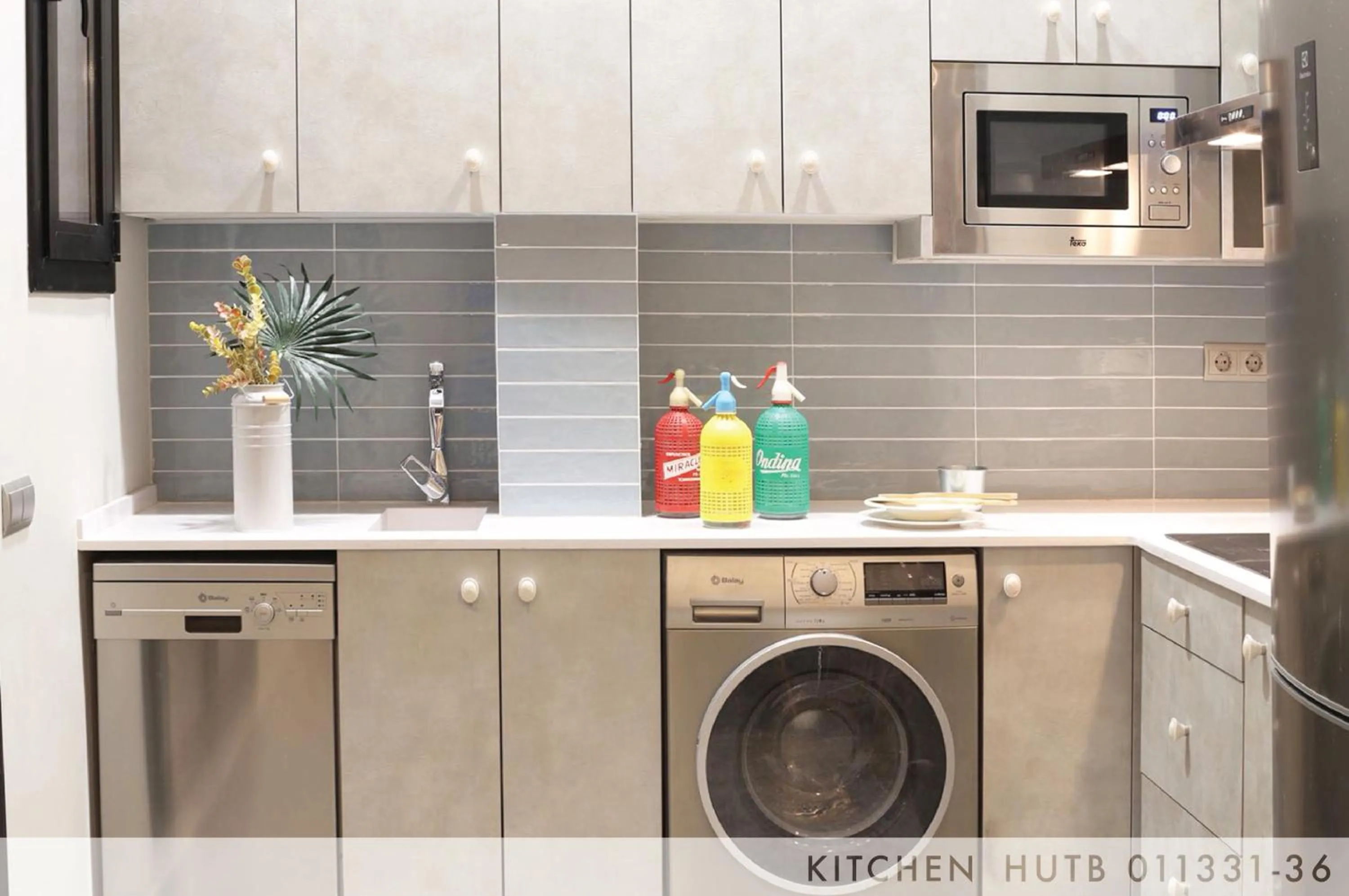 Kitchen or kitchenette in Suite Place Barcelona Còrsega