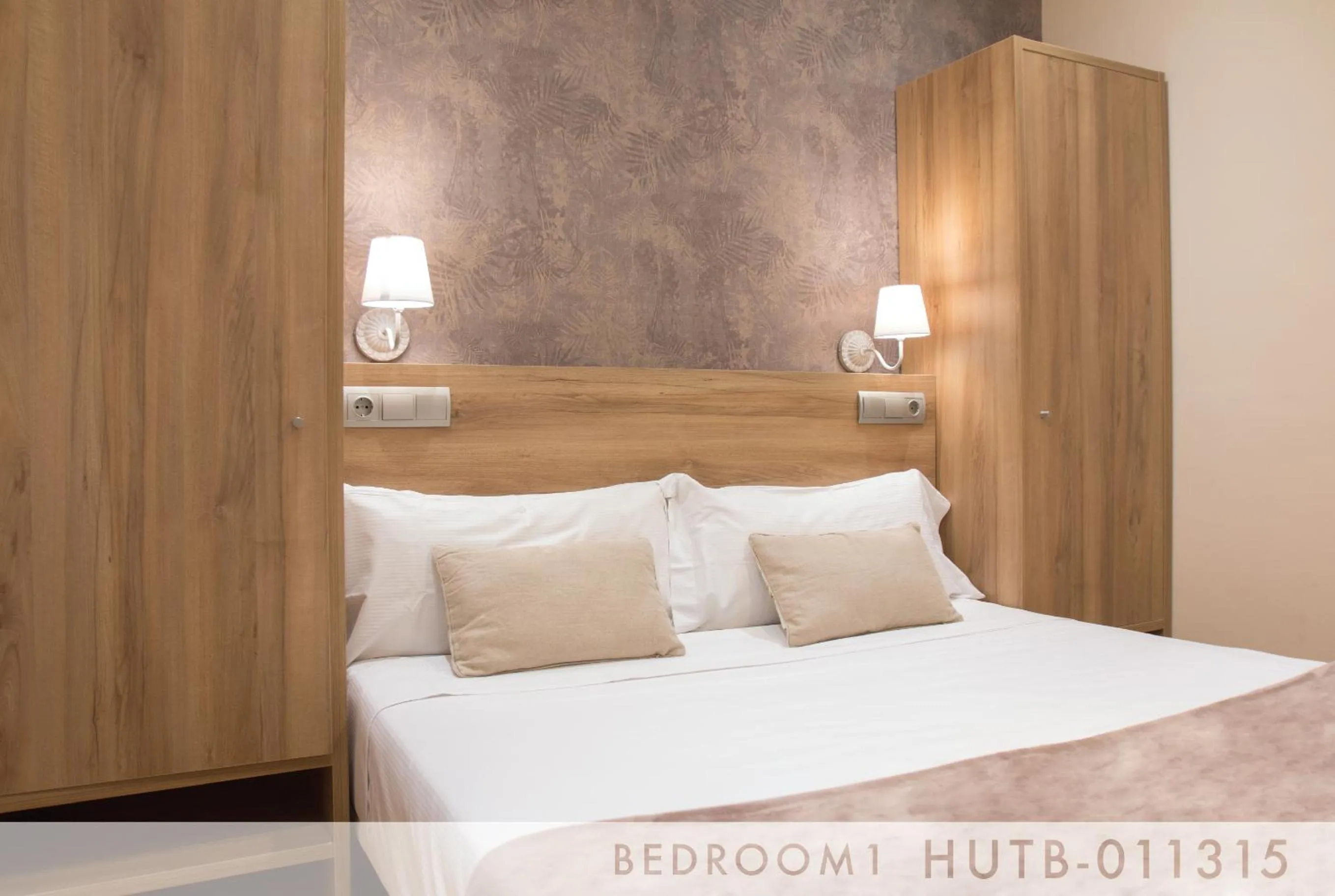 Bedroom, Bed in Suite Place Barcelona Còrsega