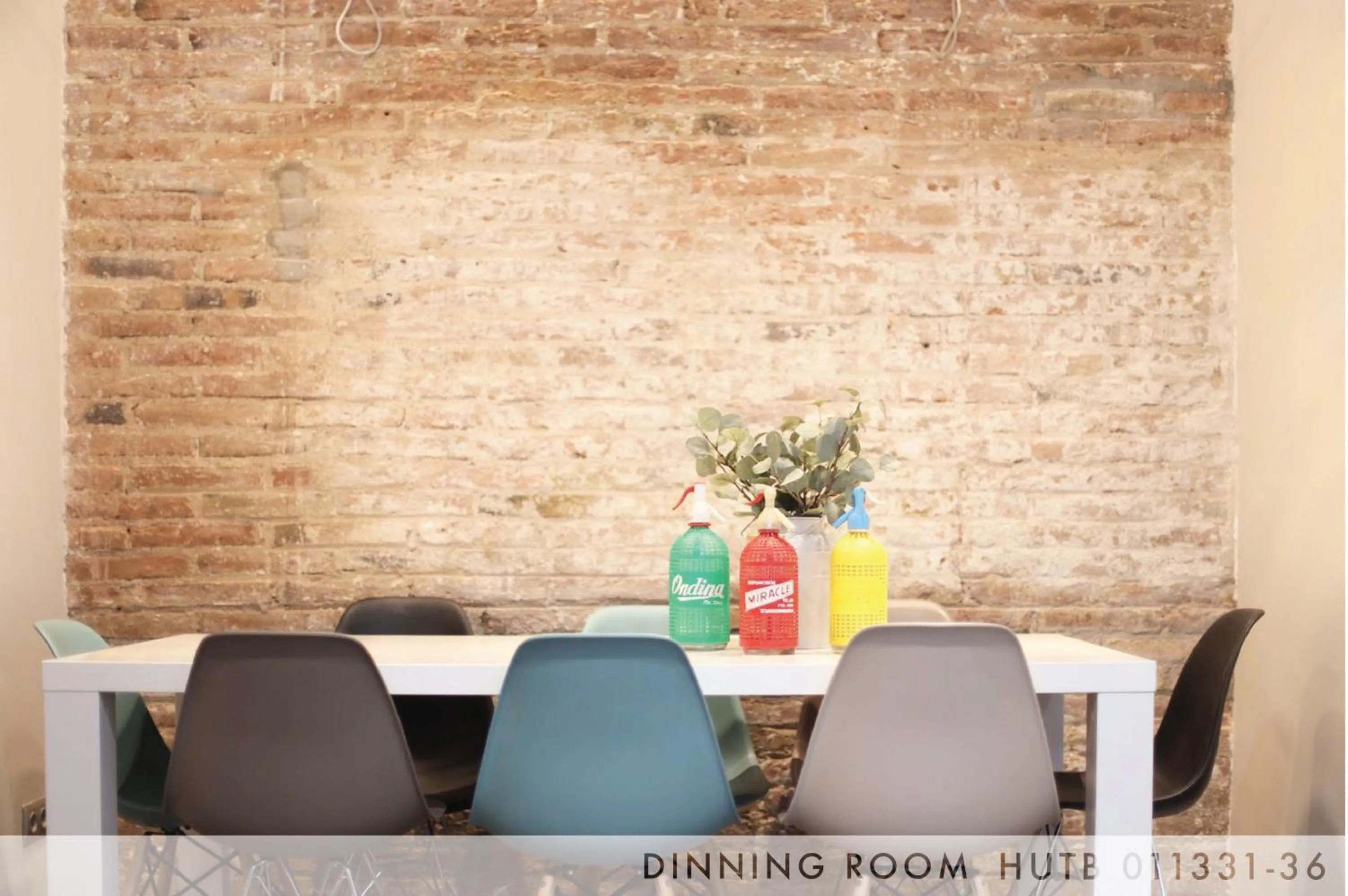 Dining area in Suite Place Barcelona Còrsega