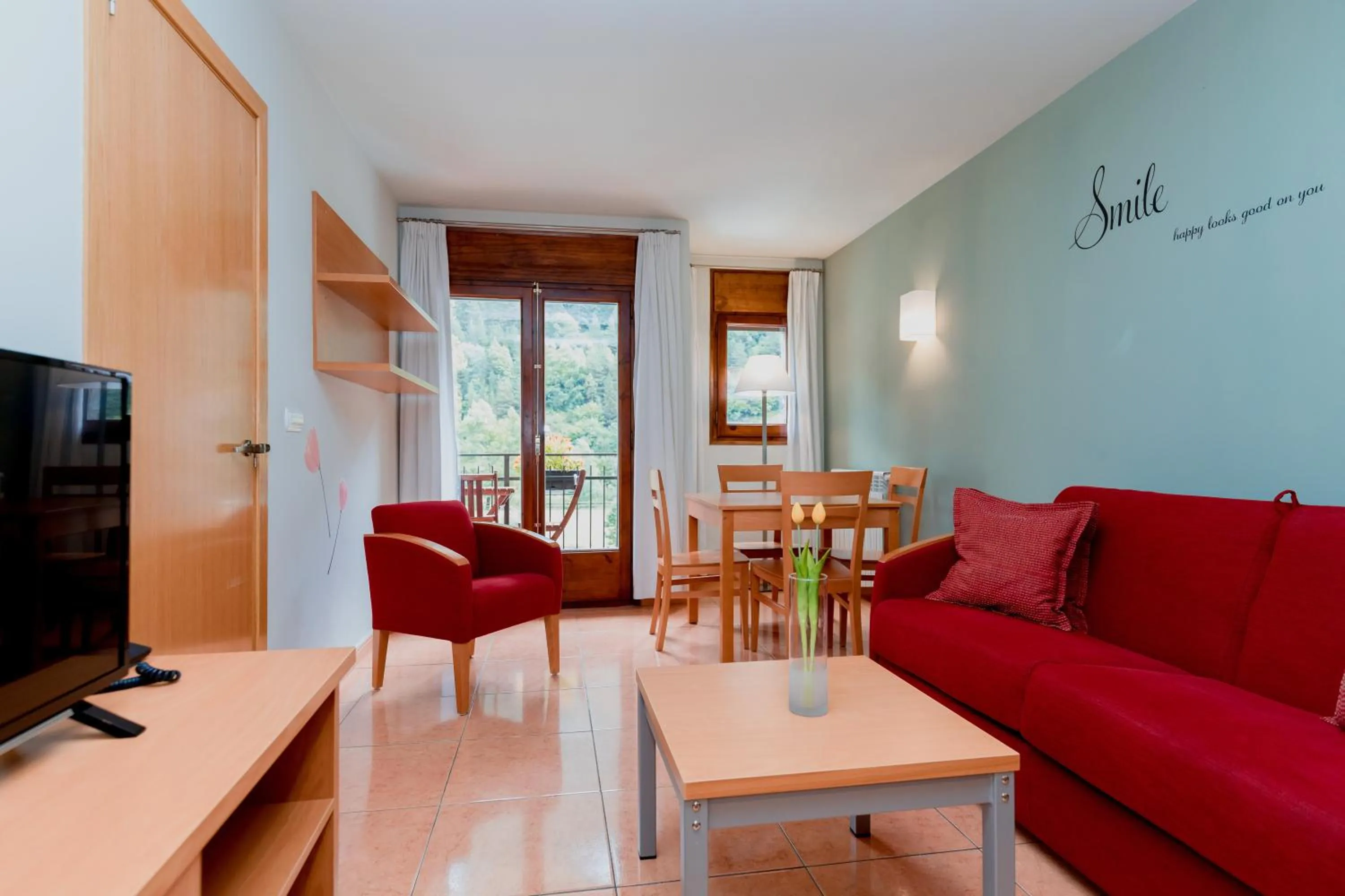 Communal lounge/ TV room in Pierre & Vacances Aparthotel La Tulipa