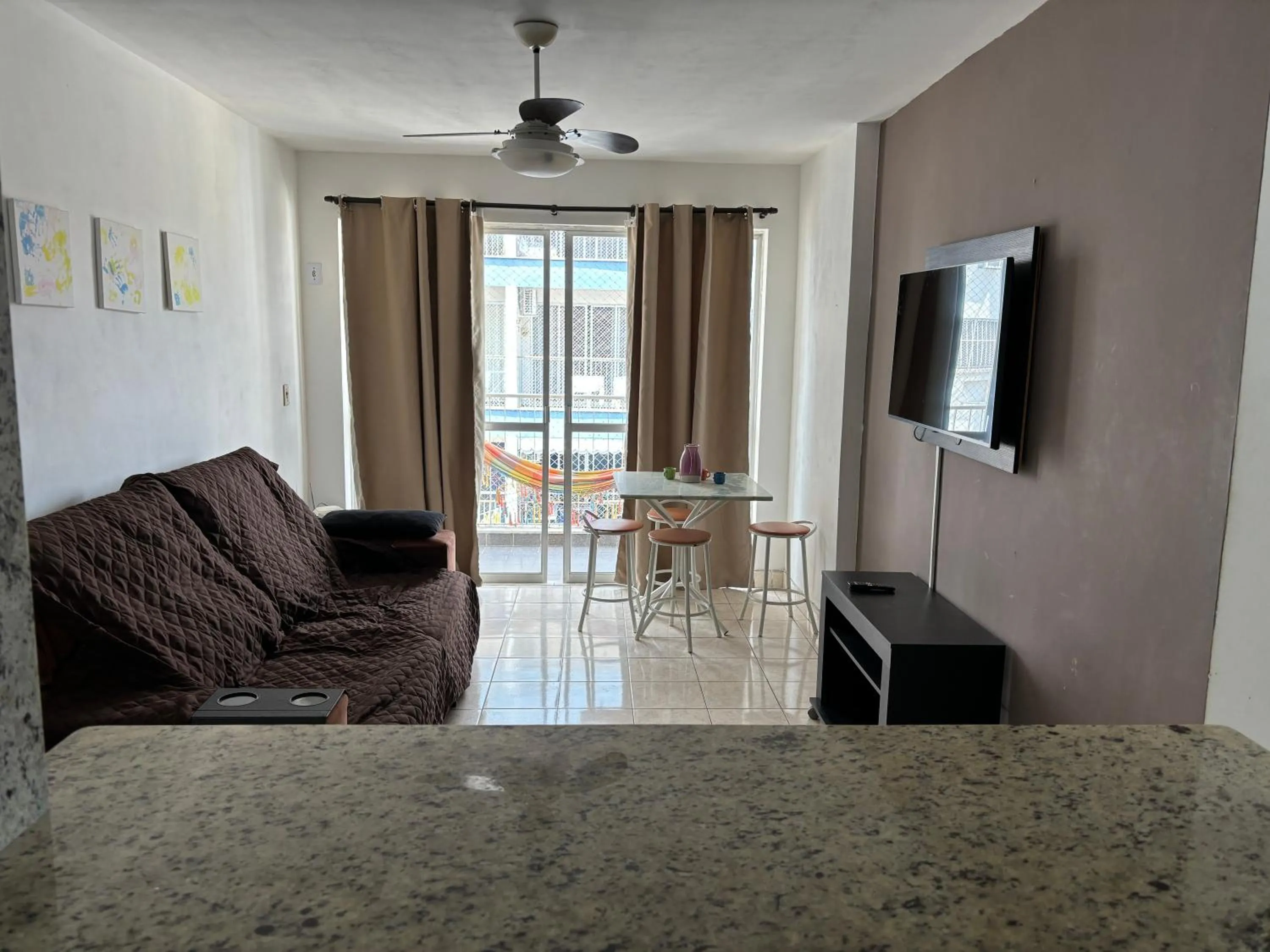 Communal lounge/ TV room in Apartament Rio Center