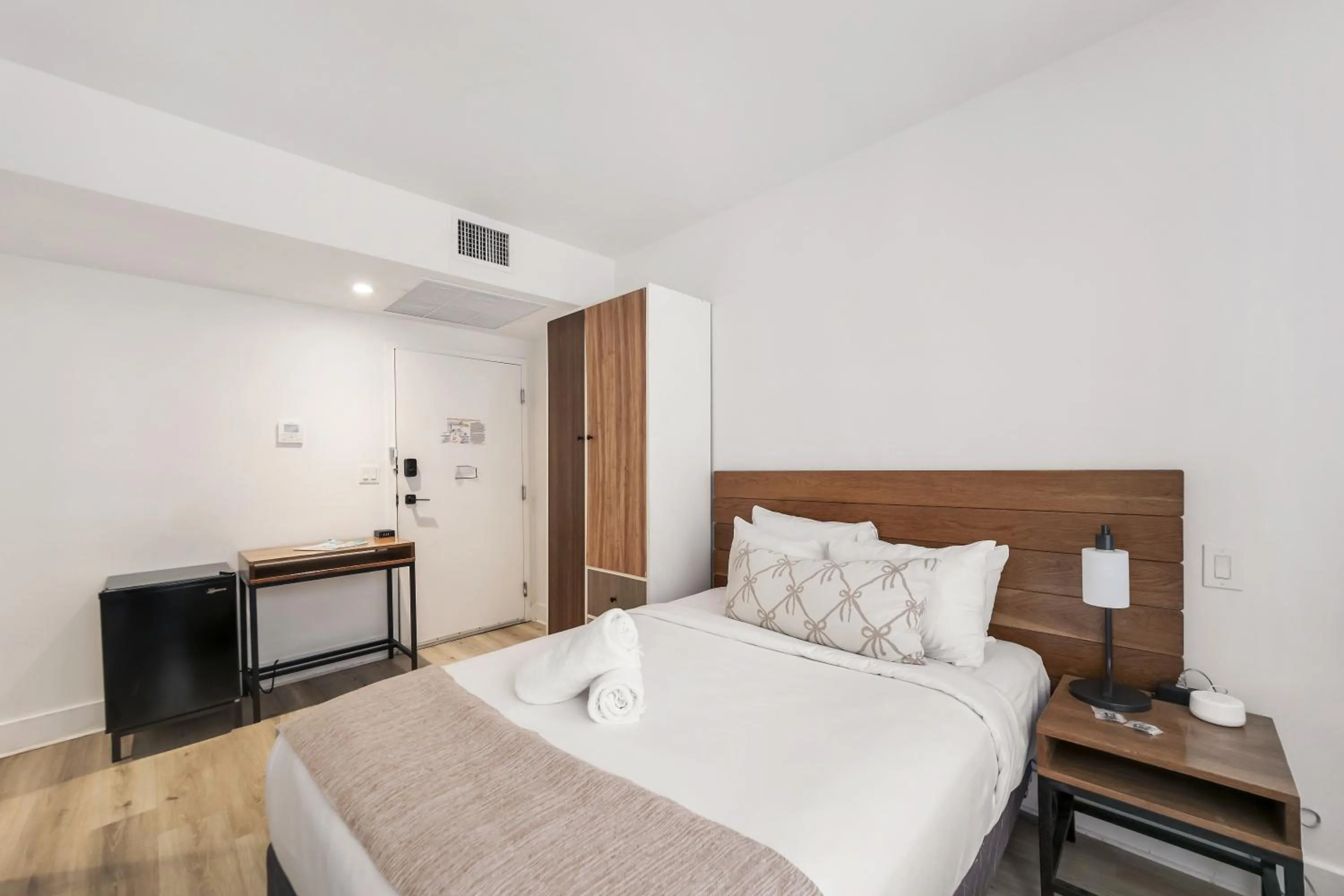 Bed in The Meridian Hotel by At Mine Hospitality