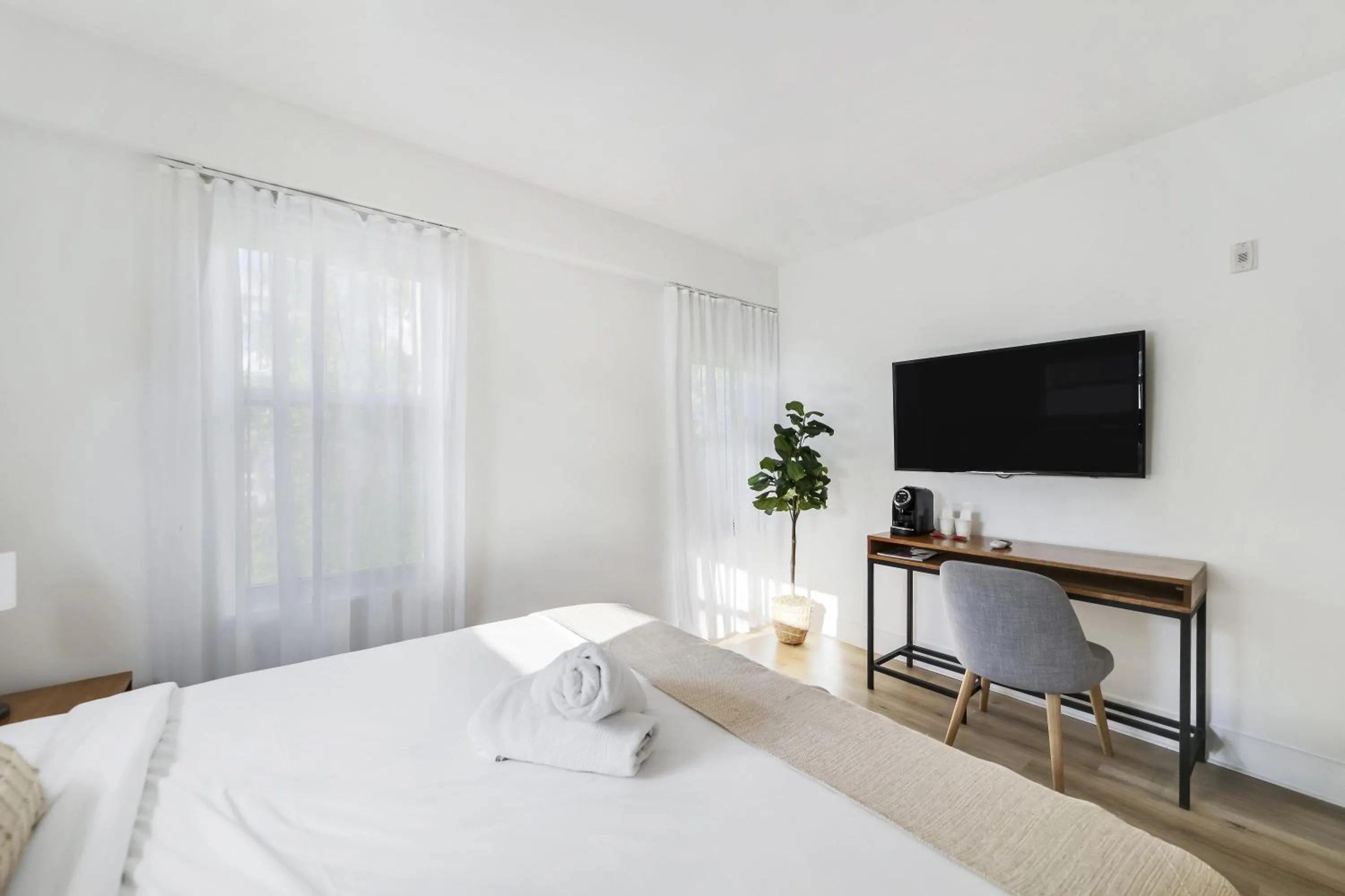 Bed in The Meridian Hotel by At Mine Hospitality