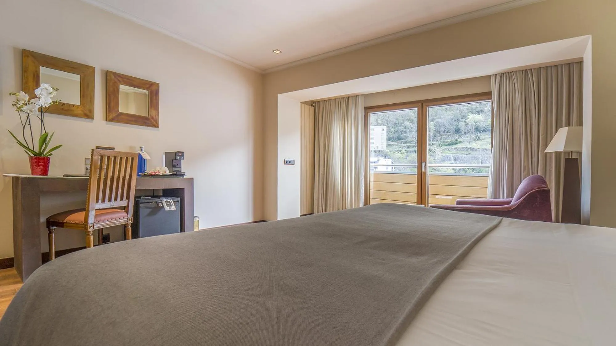 Photo of the whole room, Bed in Roc Blanc Hotel & Spa