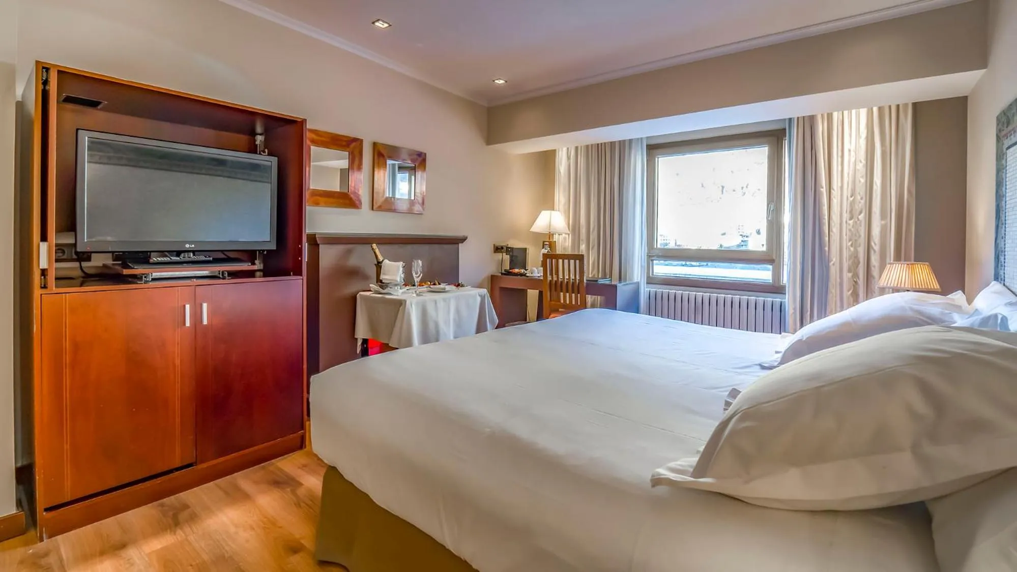 Photo of the whole room, Bed in Roc Blanc Hotel & Spa