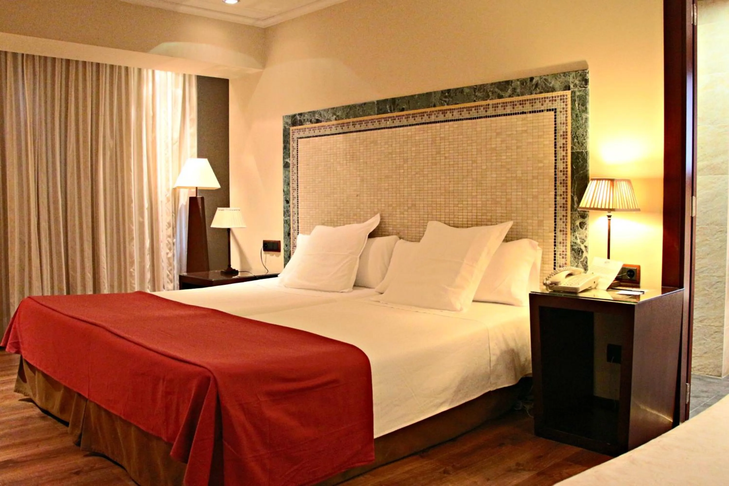 Photo of the whole room, Bed in Roc Blanc Hotel & Spa