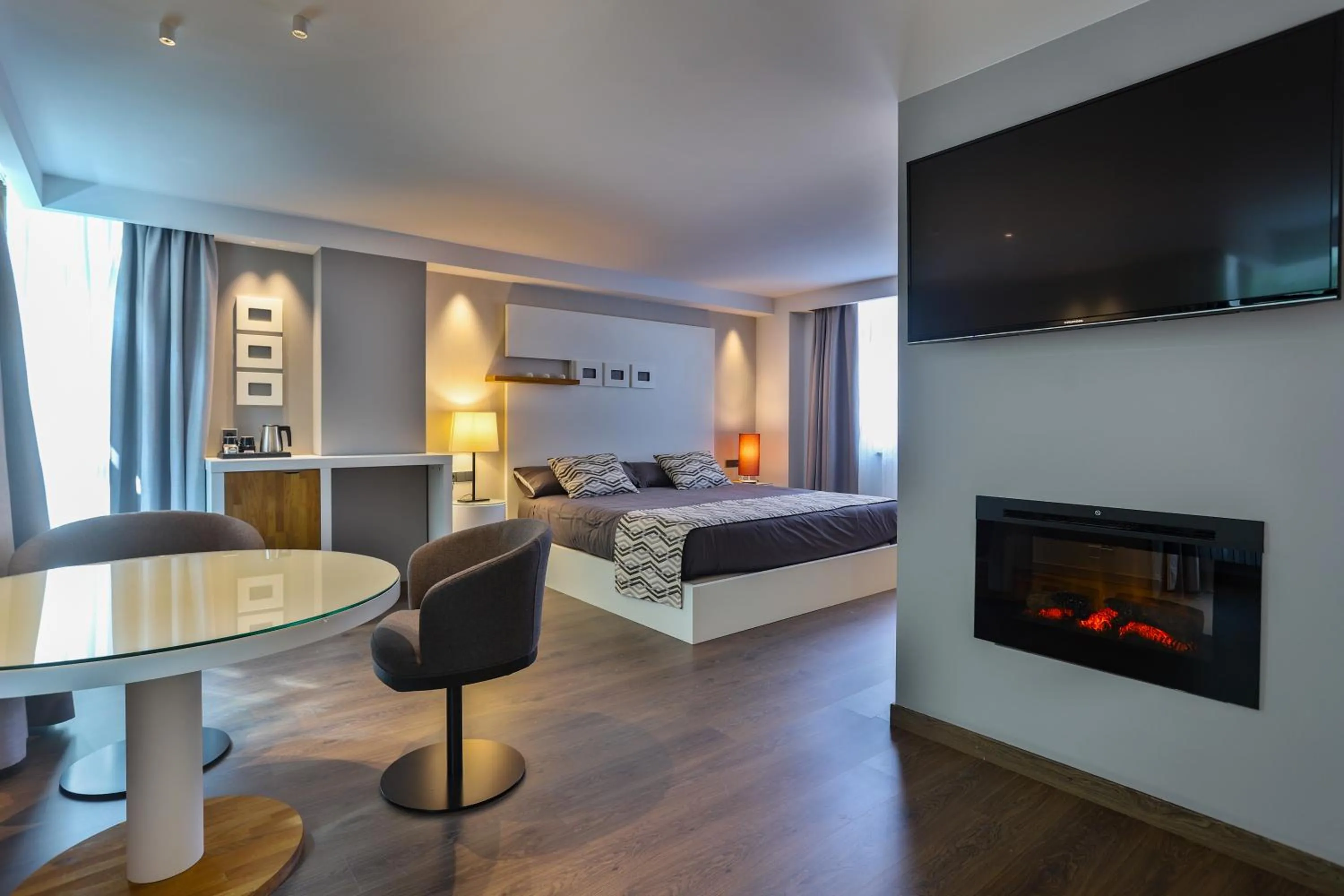 Living room, Bed in Hotel Panorama