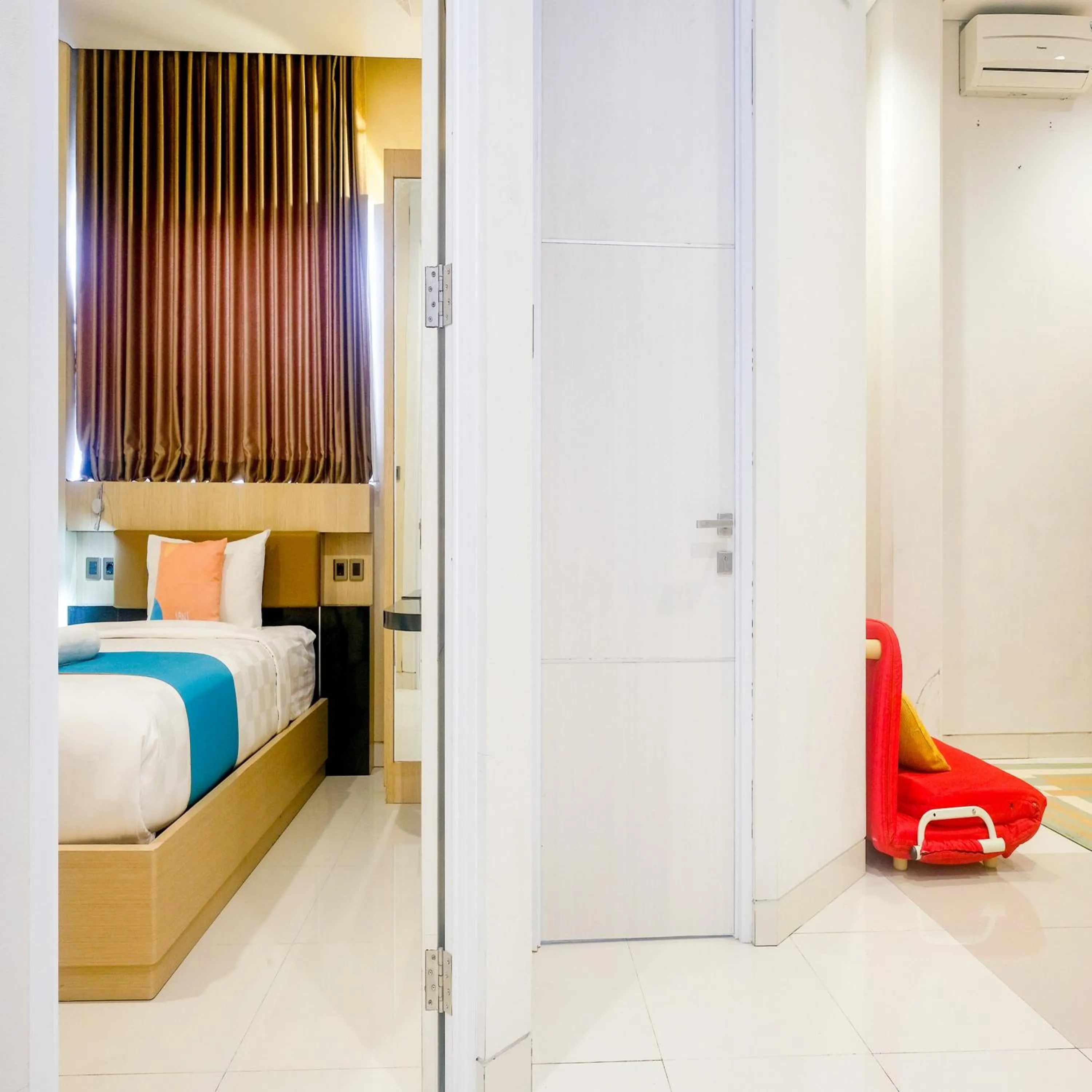 Bedroom, Bed in Sans Vibes Hotel Grand Omah Sastro Gejayan