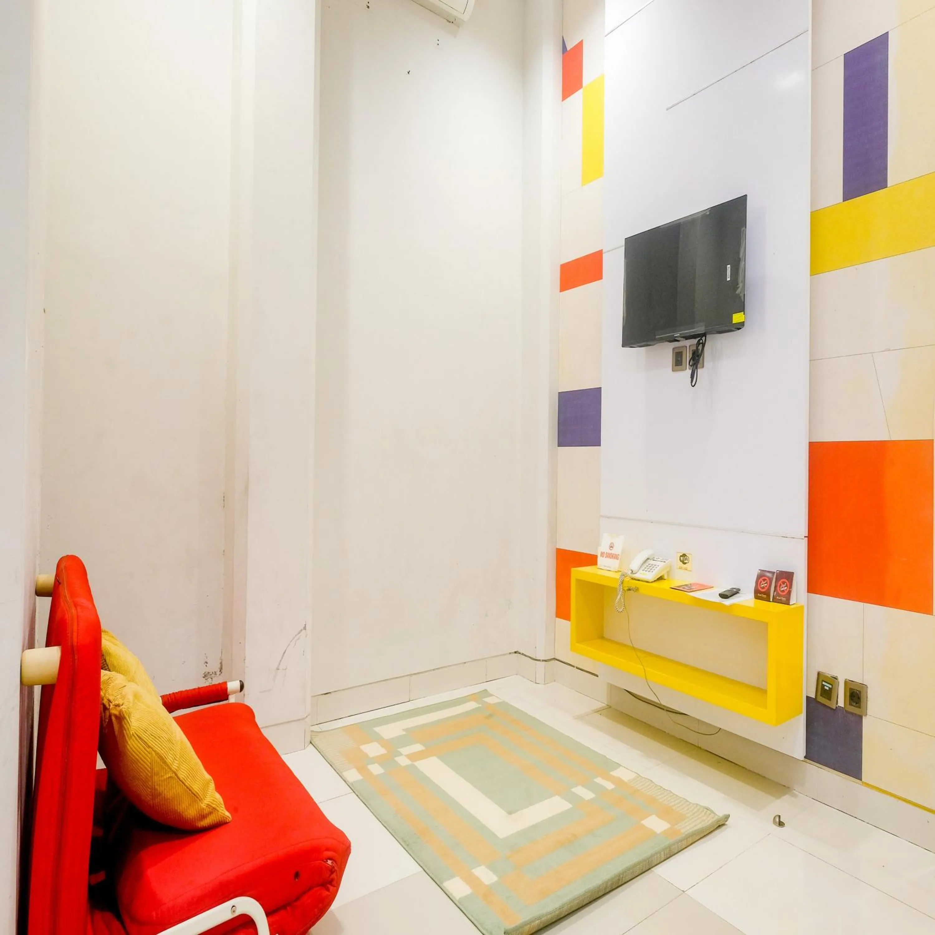 Bedroom in Sans Vibes Hotel Grand Omah Sastro Gejayan