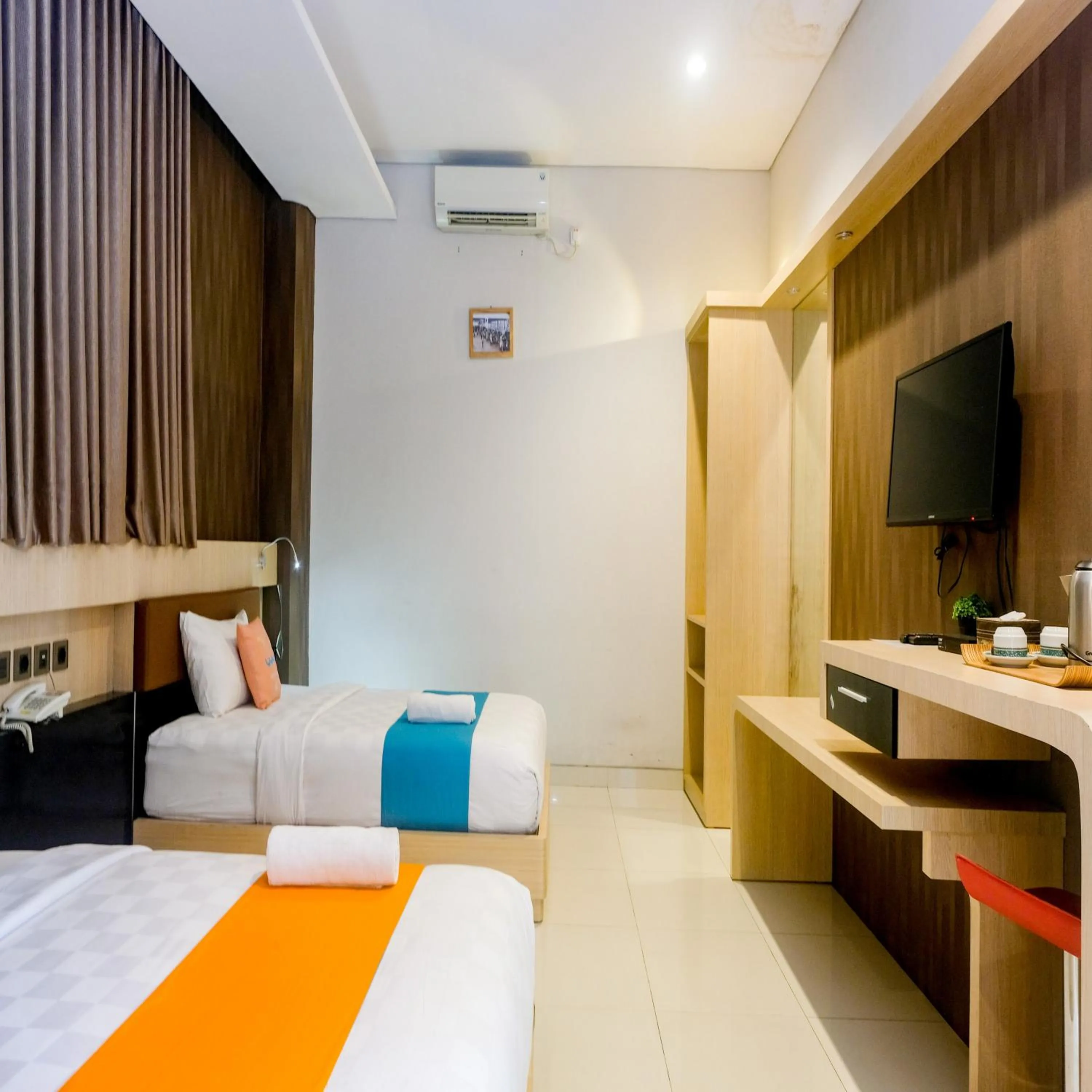 Bedroom, Bed in Sans Vibes Hotel Grand Omah Sastro Gejayan