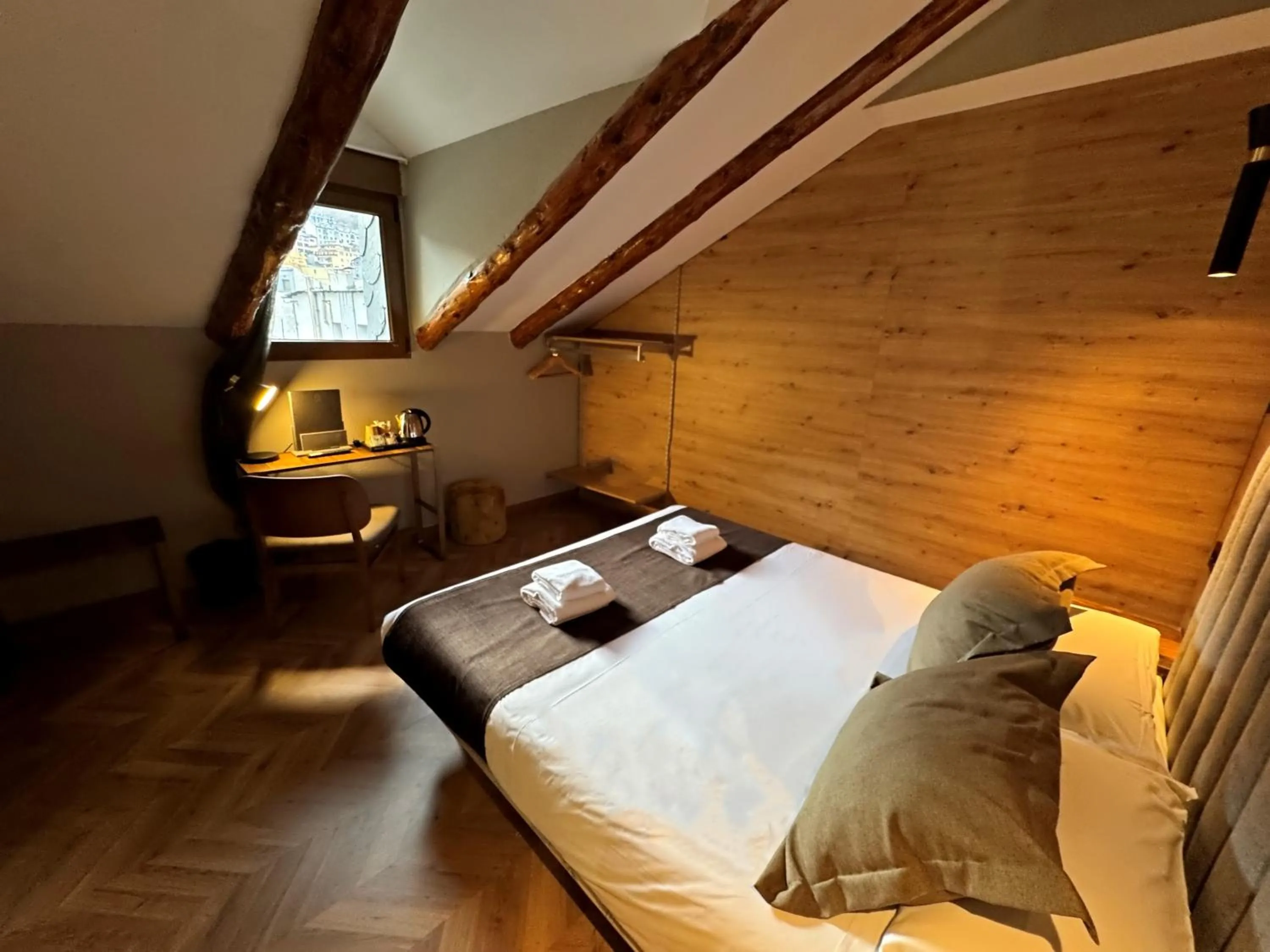 Photo of the whole room, Bed in Yomo Petit Paris