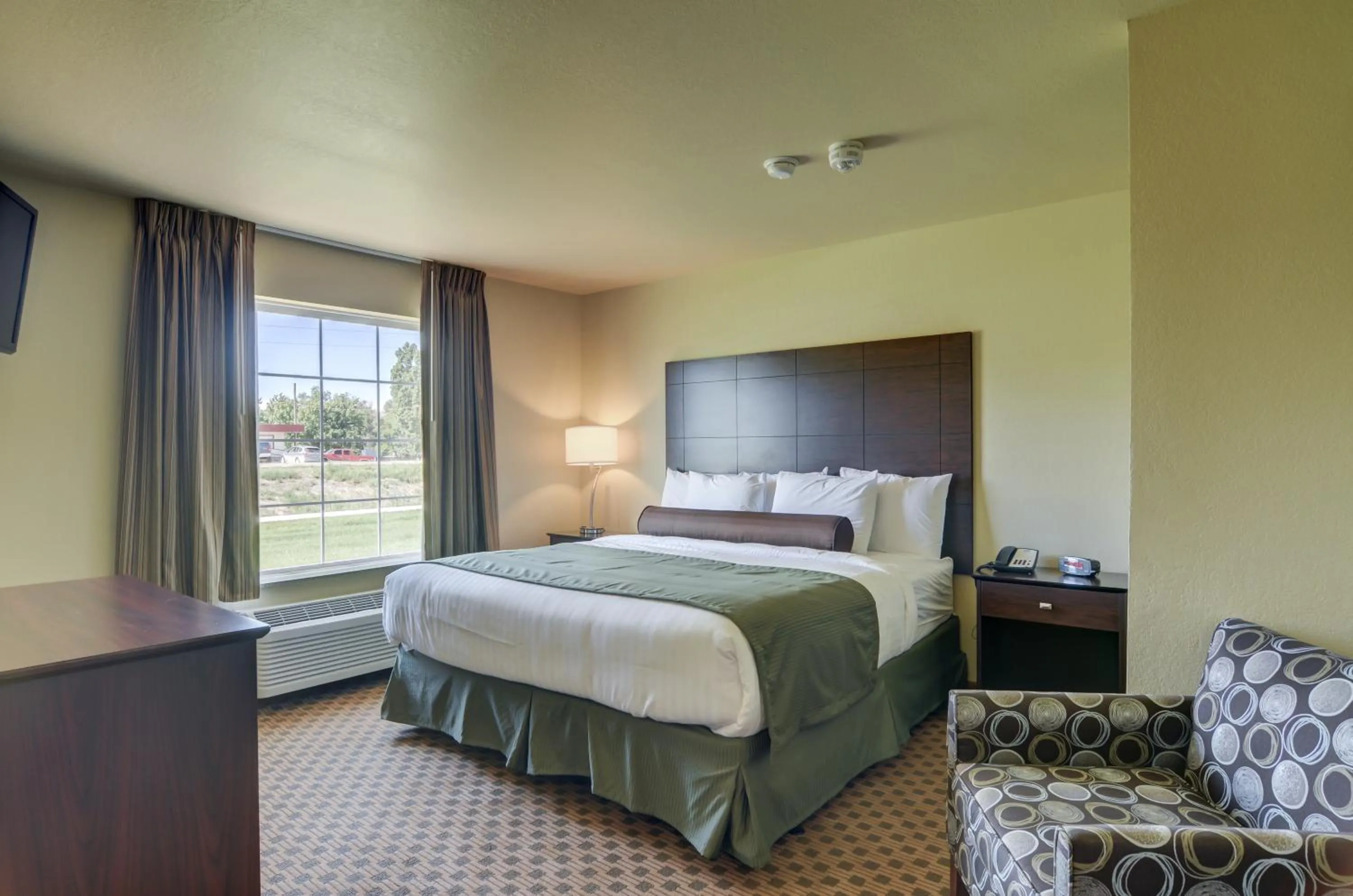 Bed in Cobblestone Inn & Suites - Ord