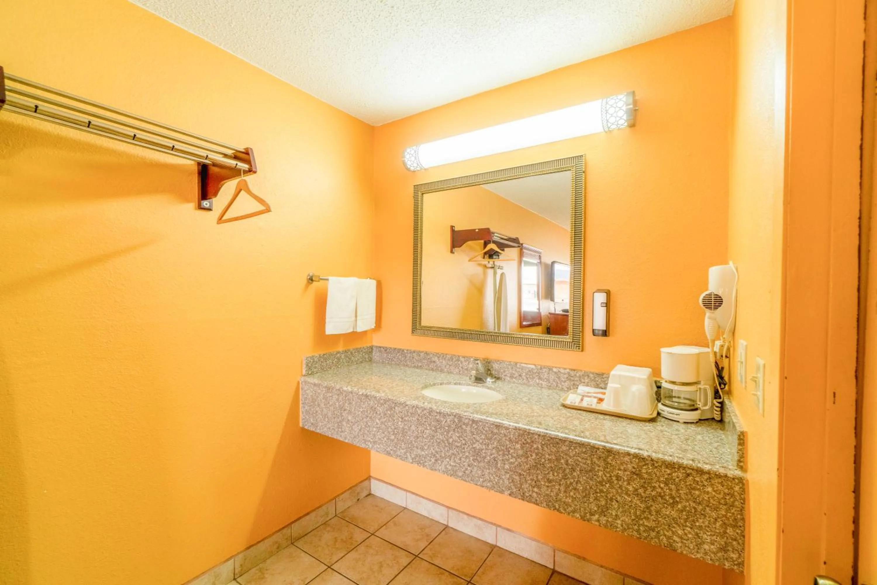 Bathroom in Crown Inn By OYO Denver Tx