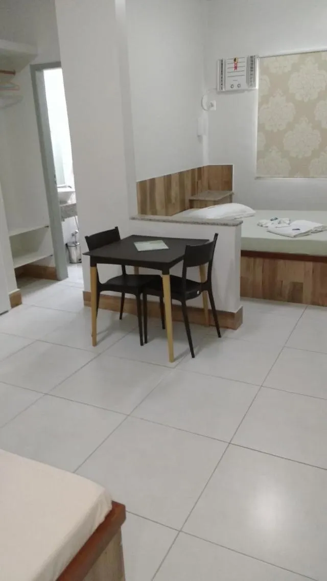 Bed in Hotel Palmeiras Ltda