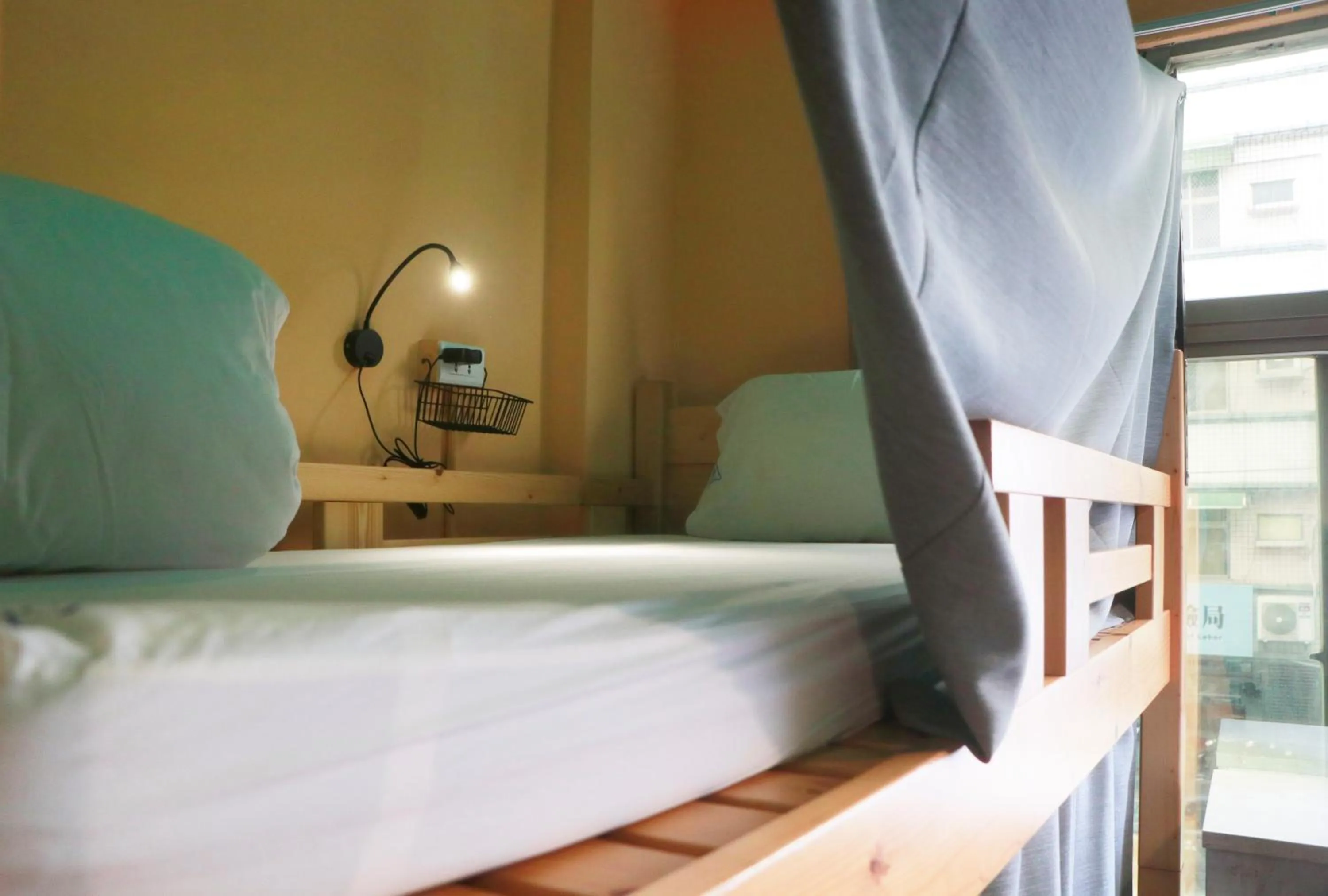 Bed in On My Way Hualien Hostel