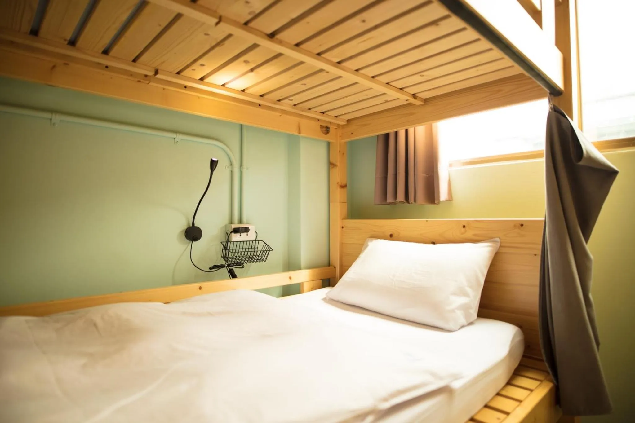 Bed in On My Way Hualien Hostel