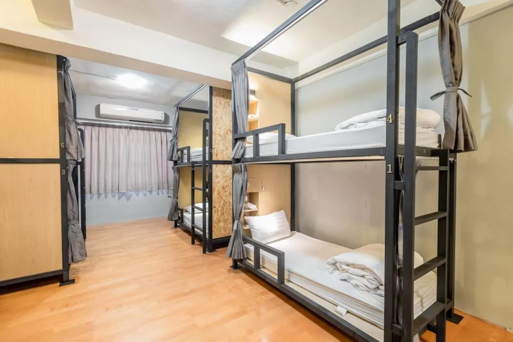 Bed in Traveller-Inn Day Moon Hotel