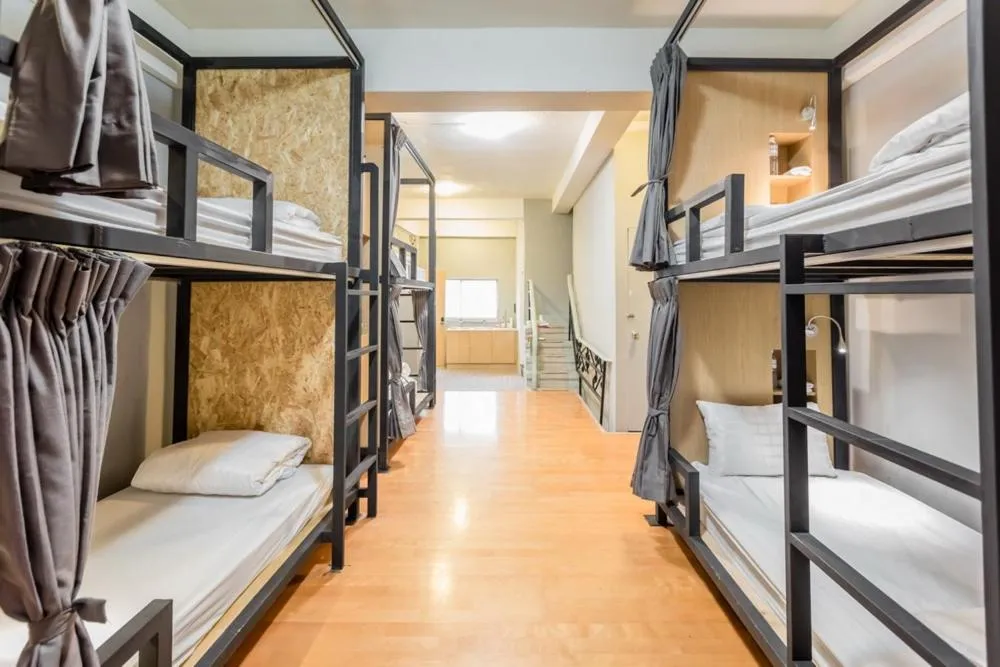 Bed in Traveller-Inn Day Moon Hotel