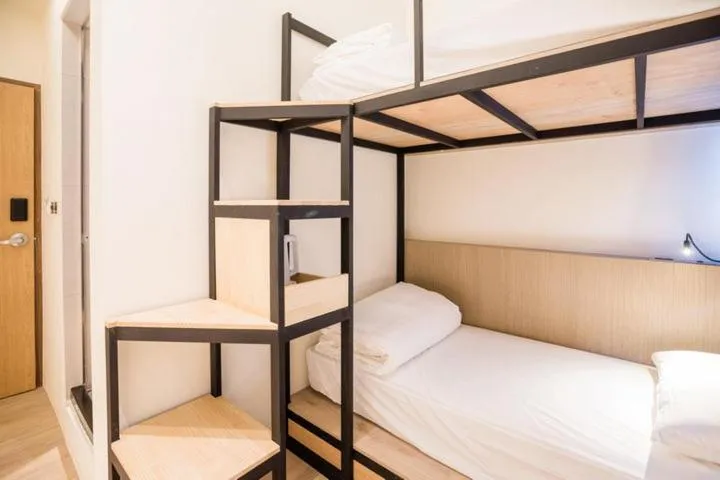 Bed in Traveller-Inn Day Moon Hotel