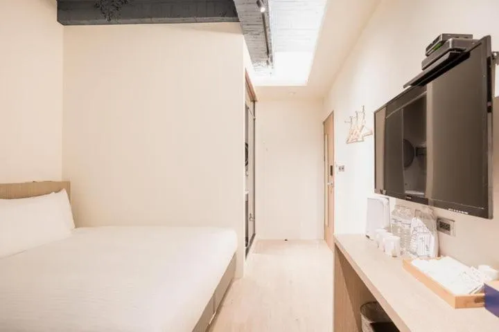 Bed in Traveller-Inn Day Moon Hotel