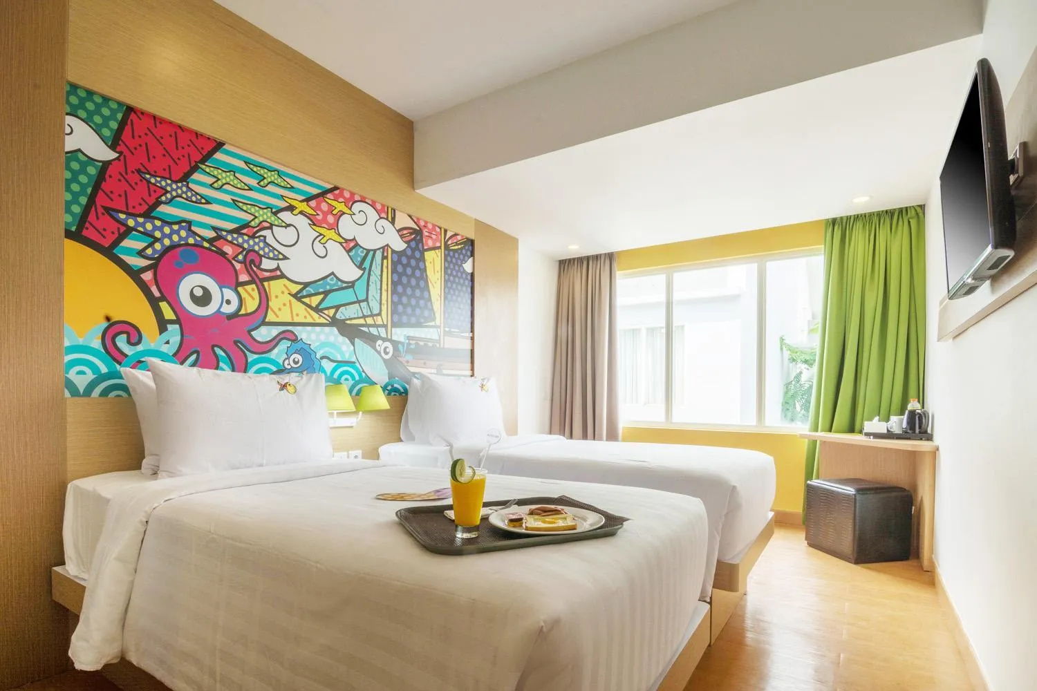 Bed in MaxOneHotels at Resort Makassar