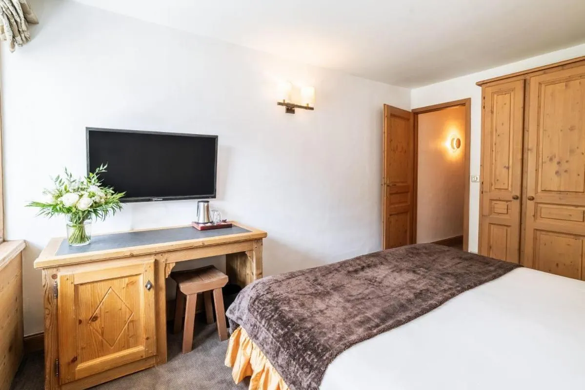 Bed in La Maison Hôtel Les Peupliers