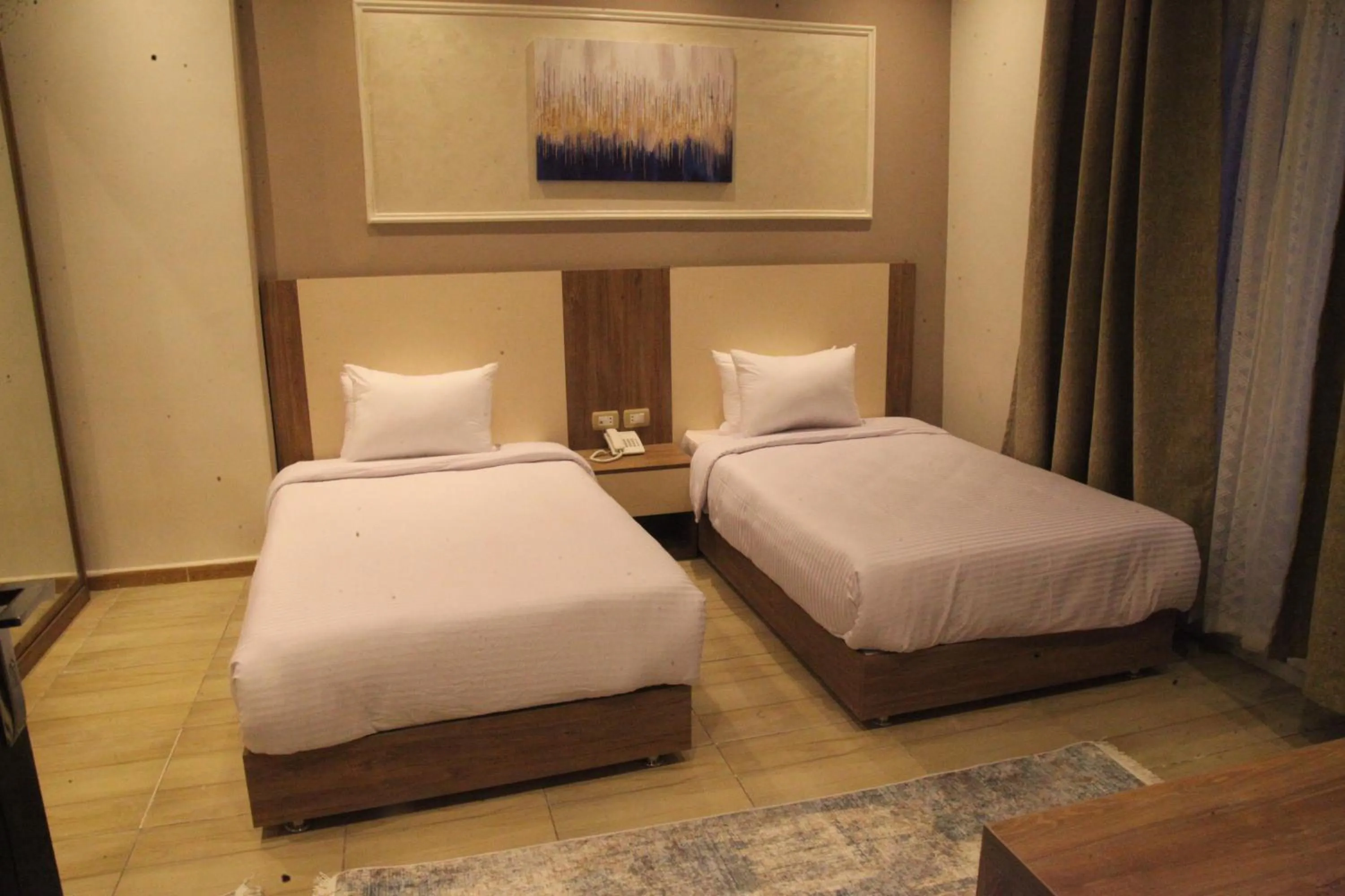 Bed in Jewel Assiut Hotel