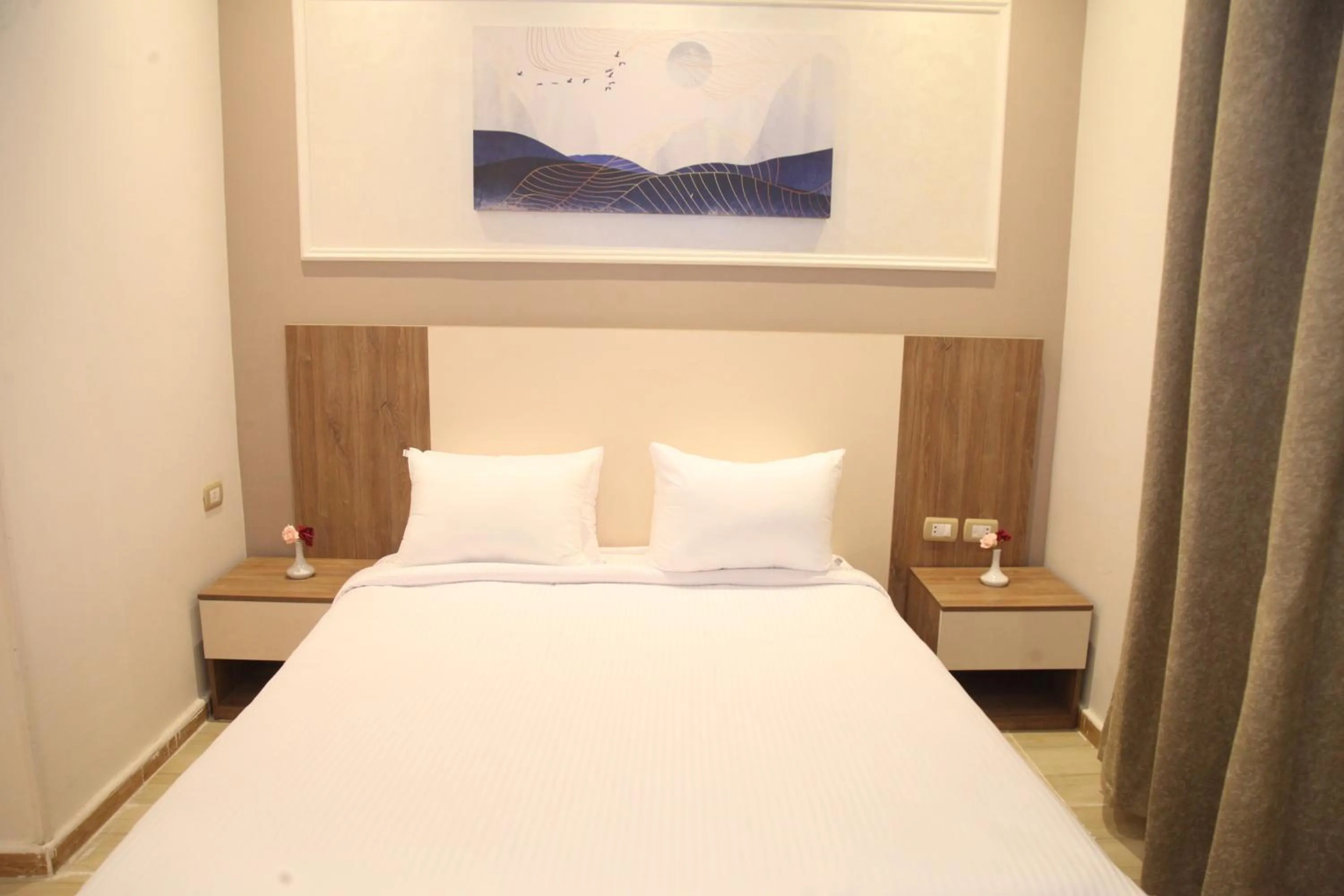 Bed in Jewel Assiut Hotel