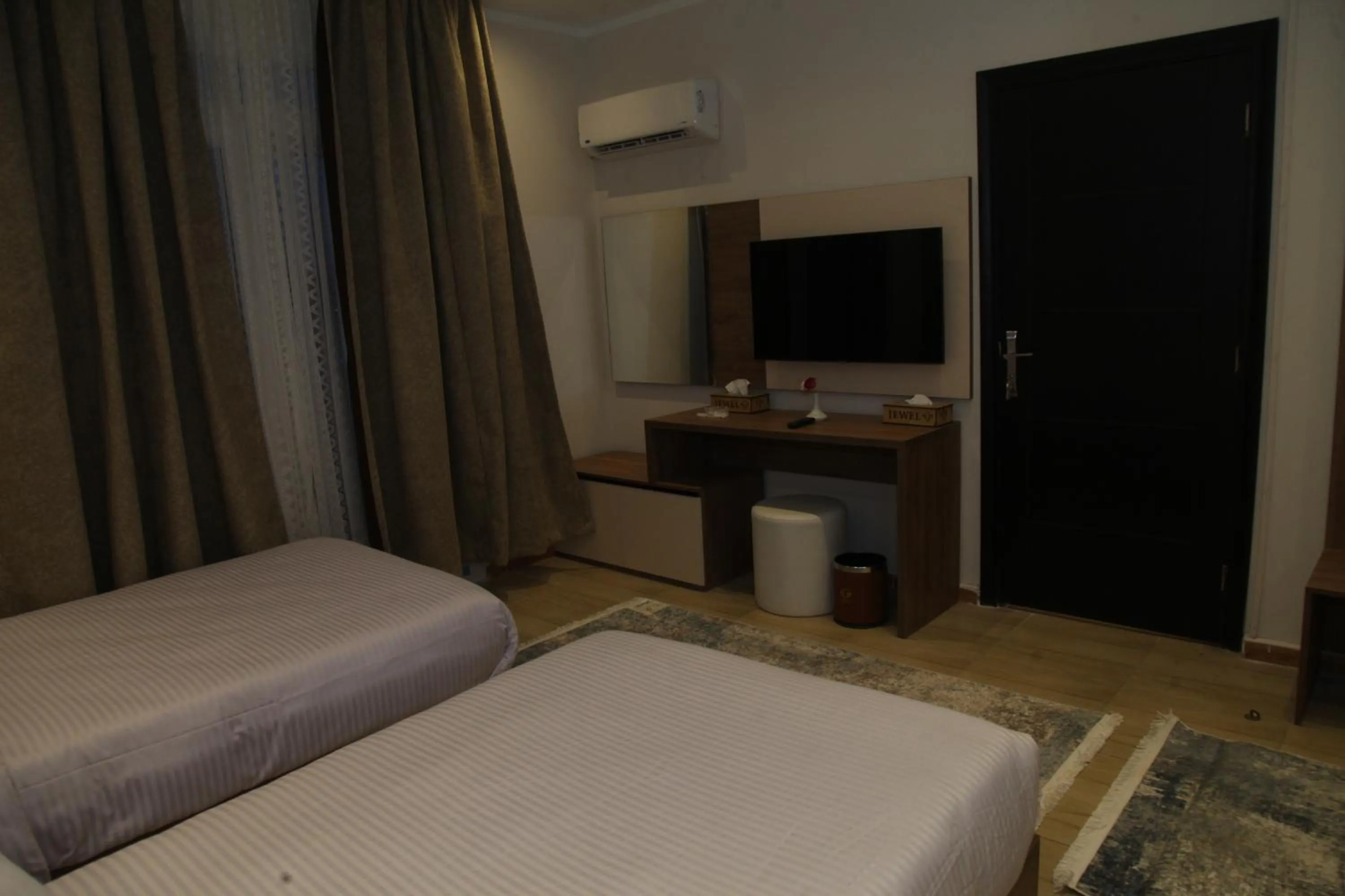 TV and multimedia, Bed in Jewel Assiut Hotel