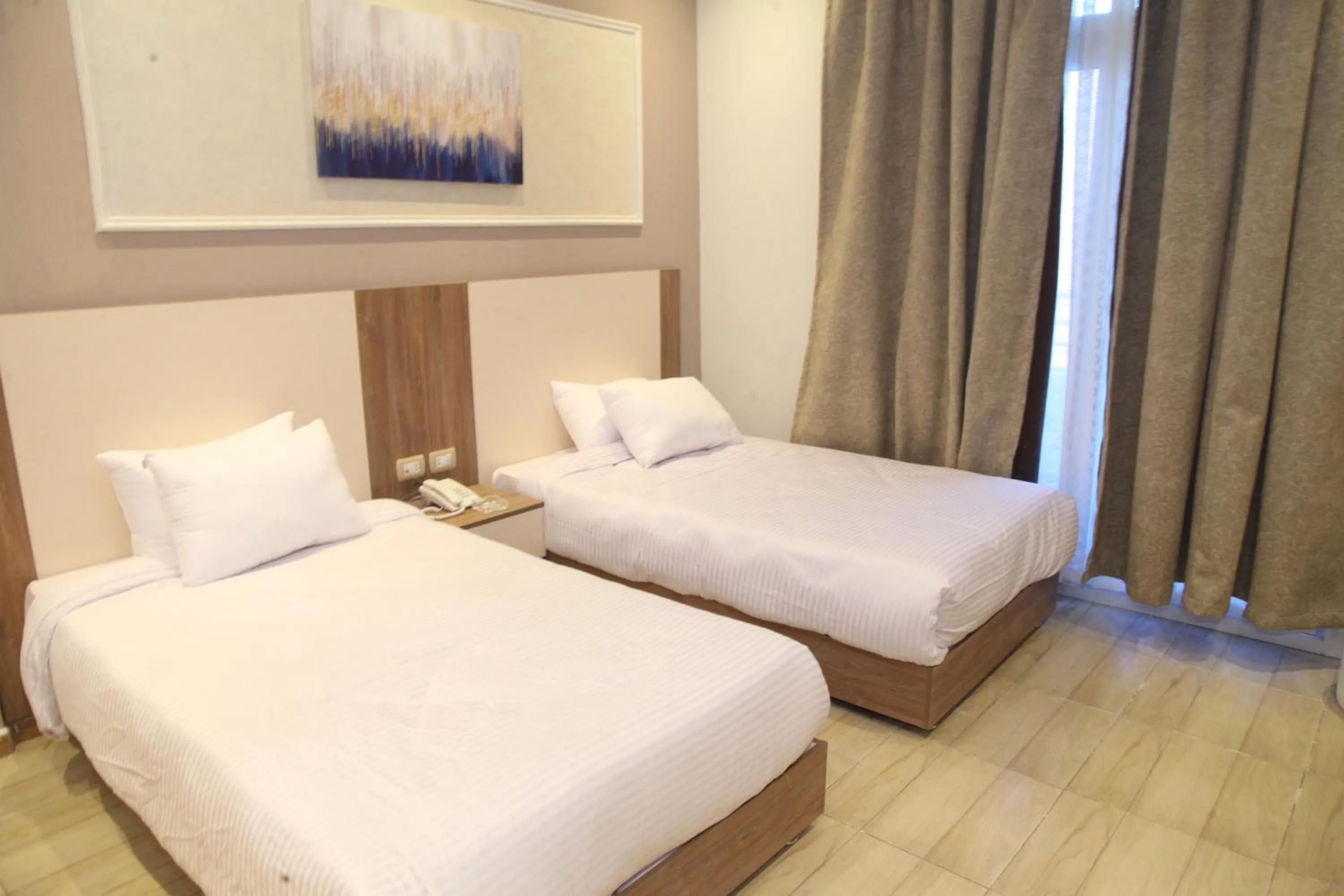 Bed in Jewel Assiut Hotel