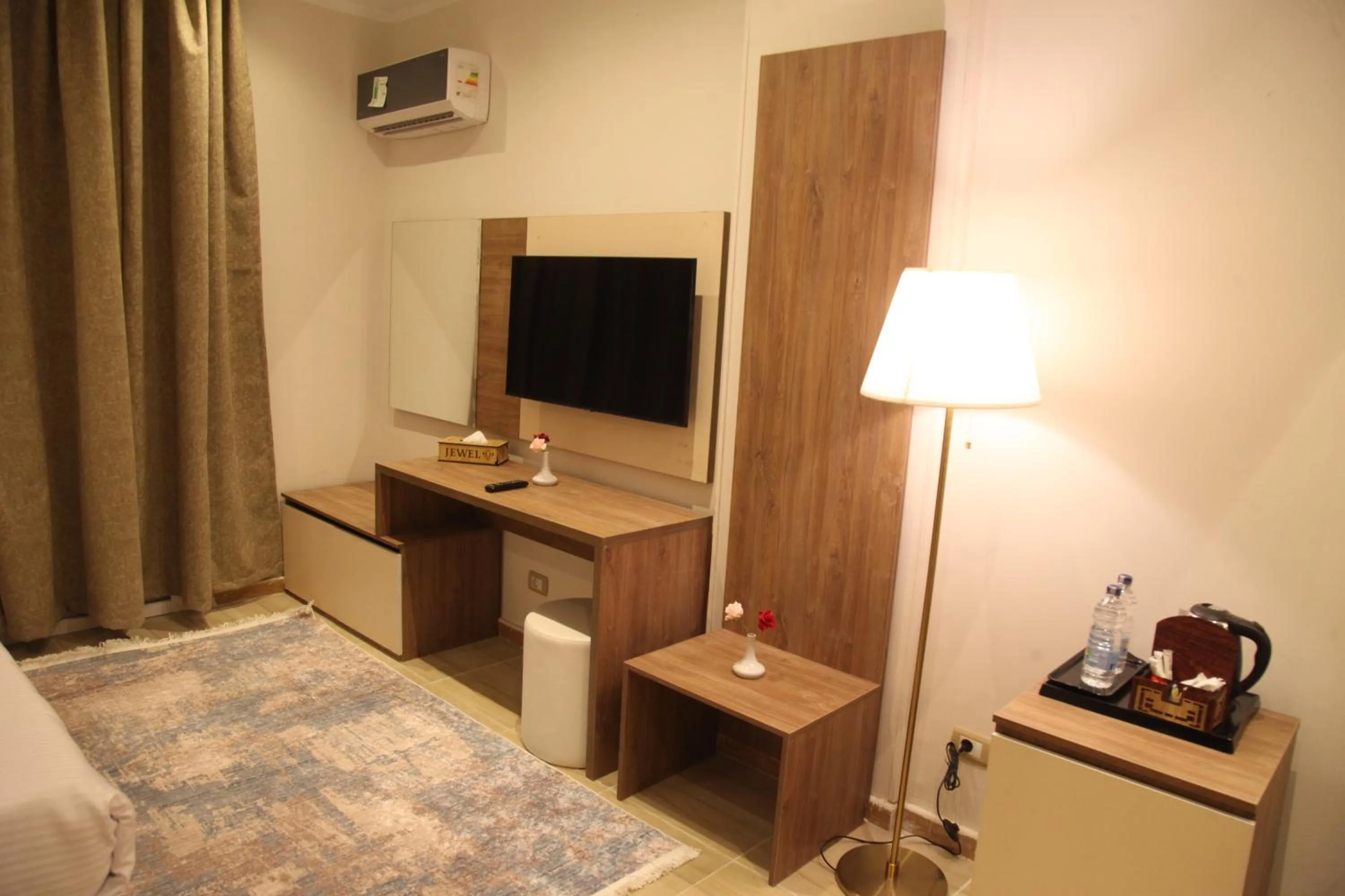 TV and multimedia, Bed in Jewel Assiut Hotel