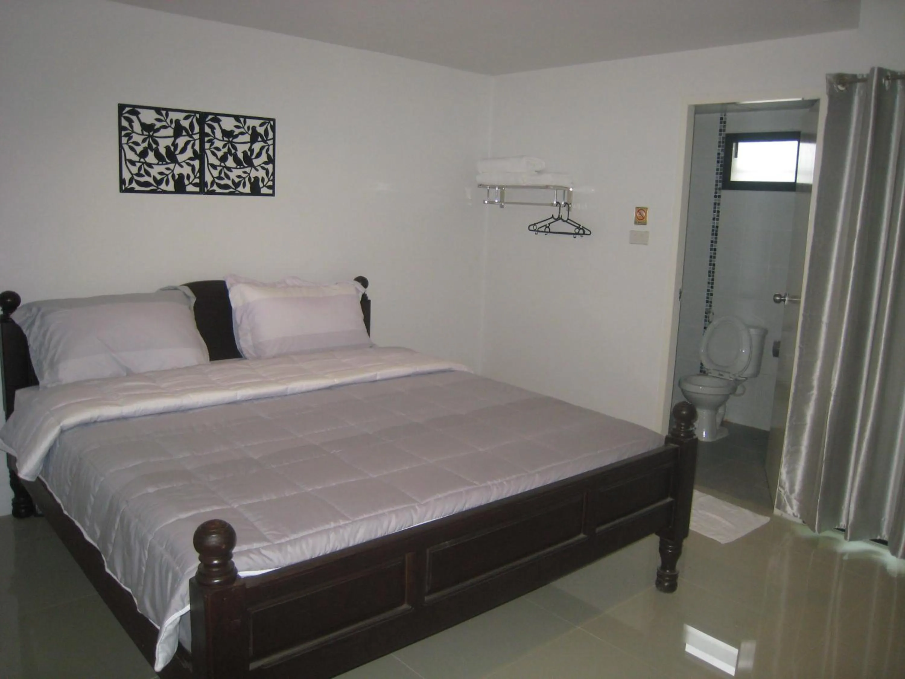 Bed in Ma Room Place Sukhothai Resort