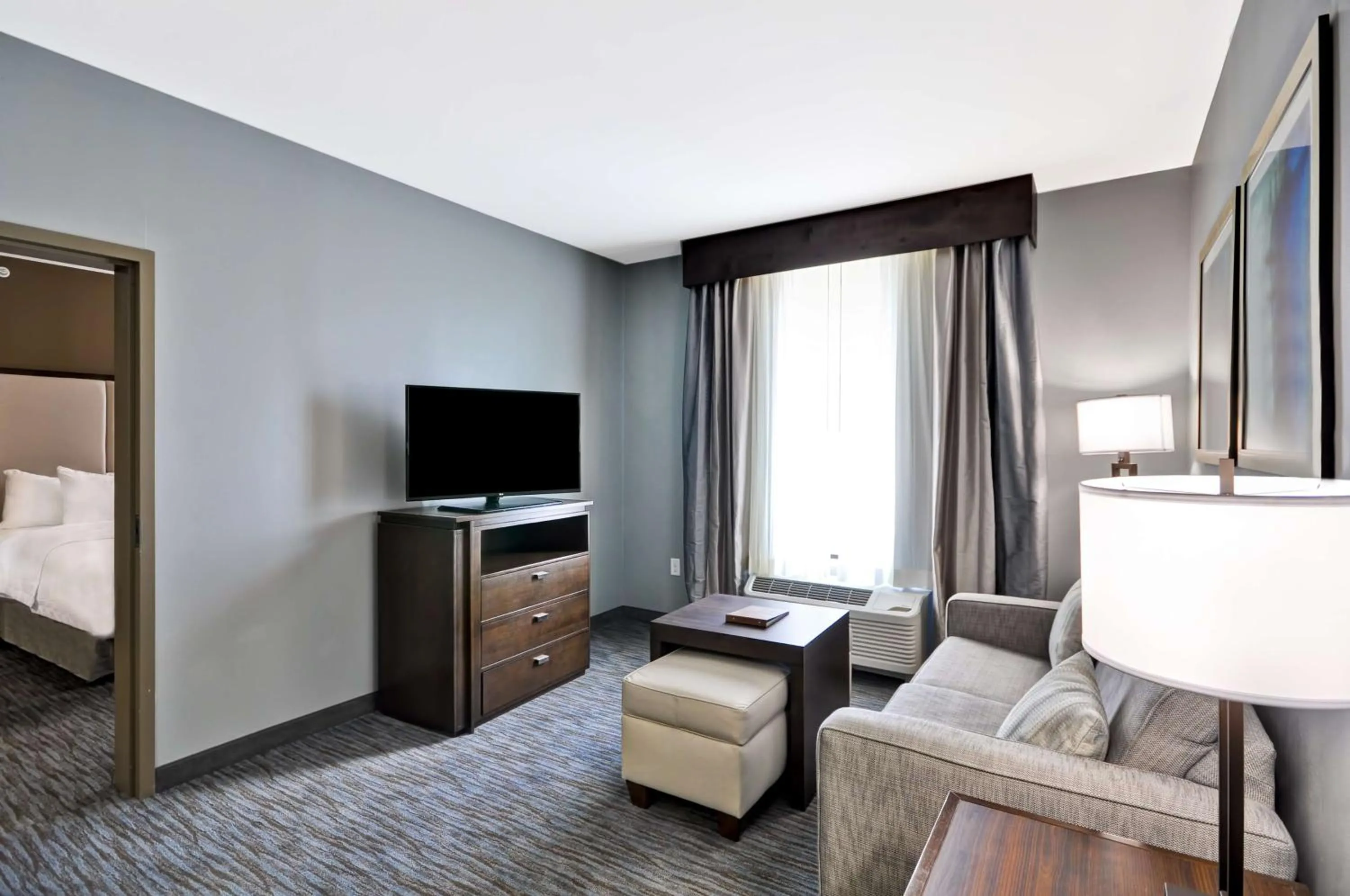 Living room, Bed in Homewood Suites by Hilton New Braunfels
