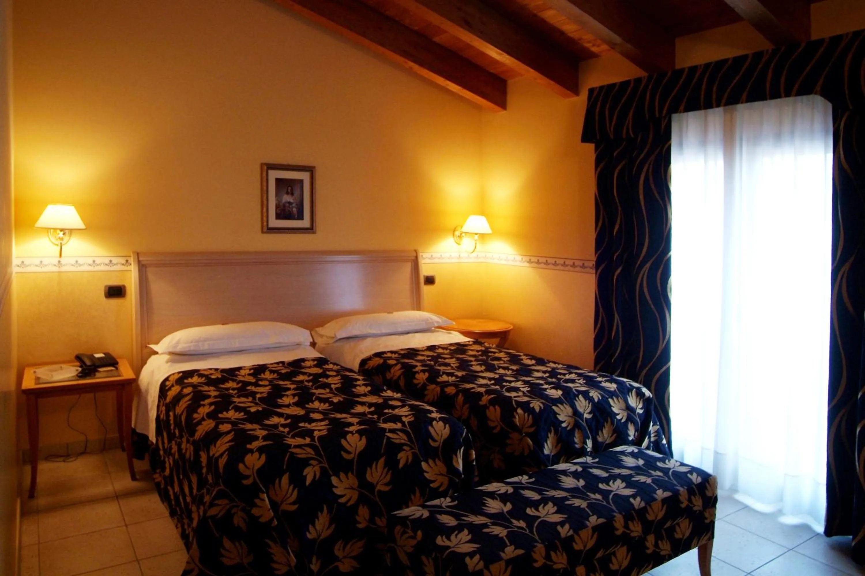 Photo of the whole room, Bed in Hotel Ristorante Novecento