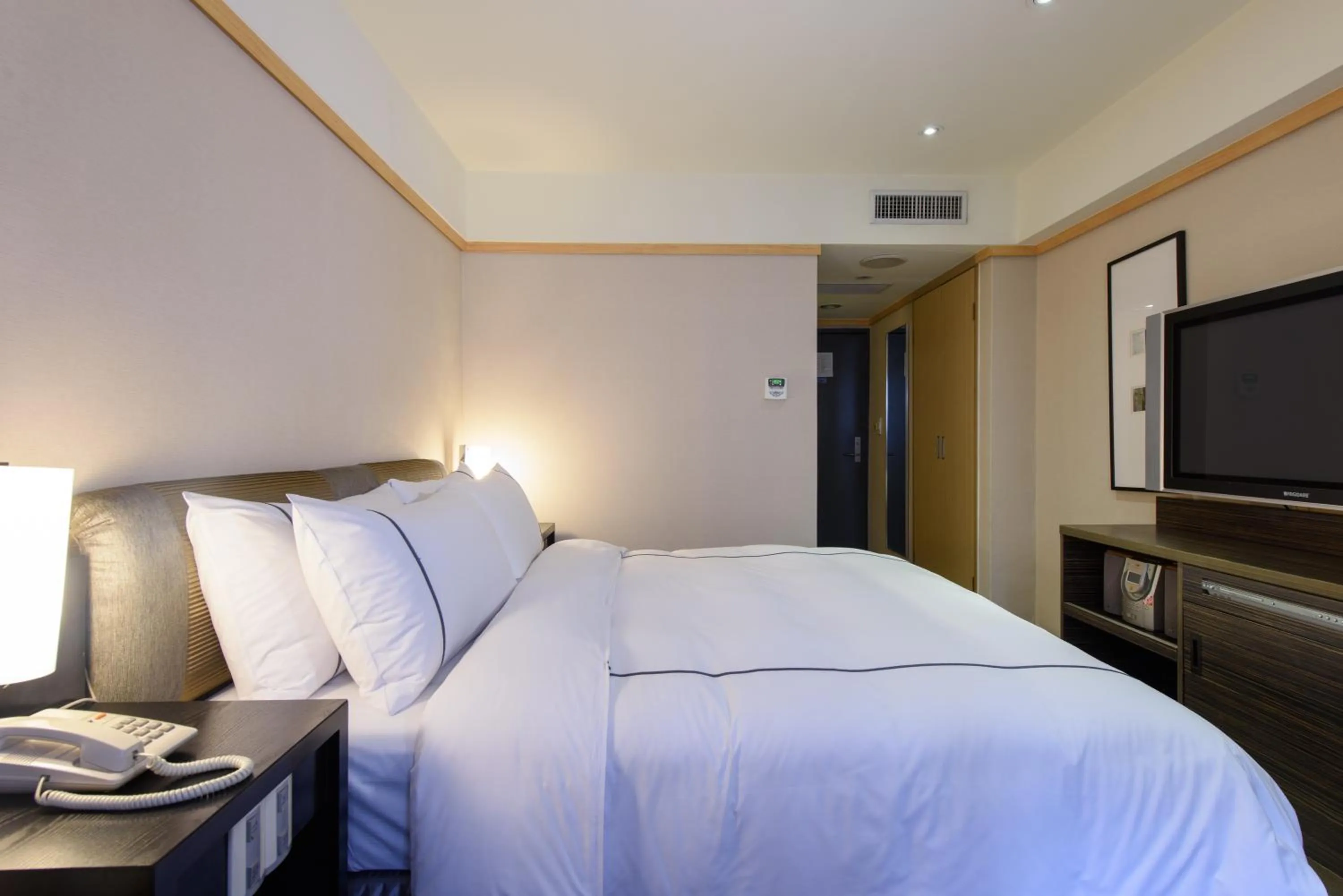 Bed in K Hotel Taipei