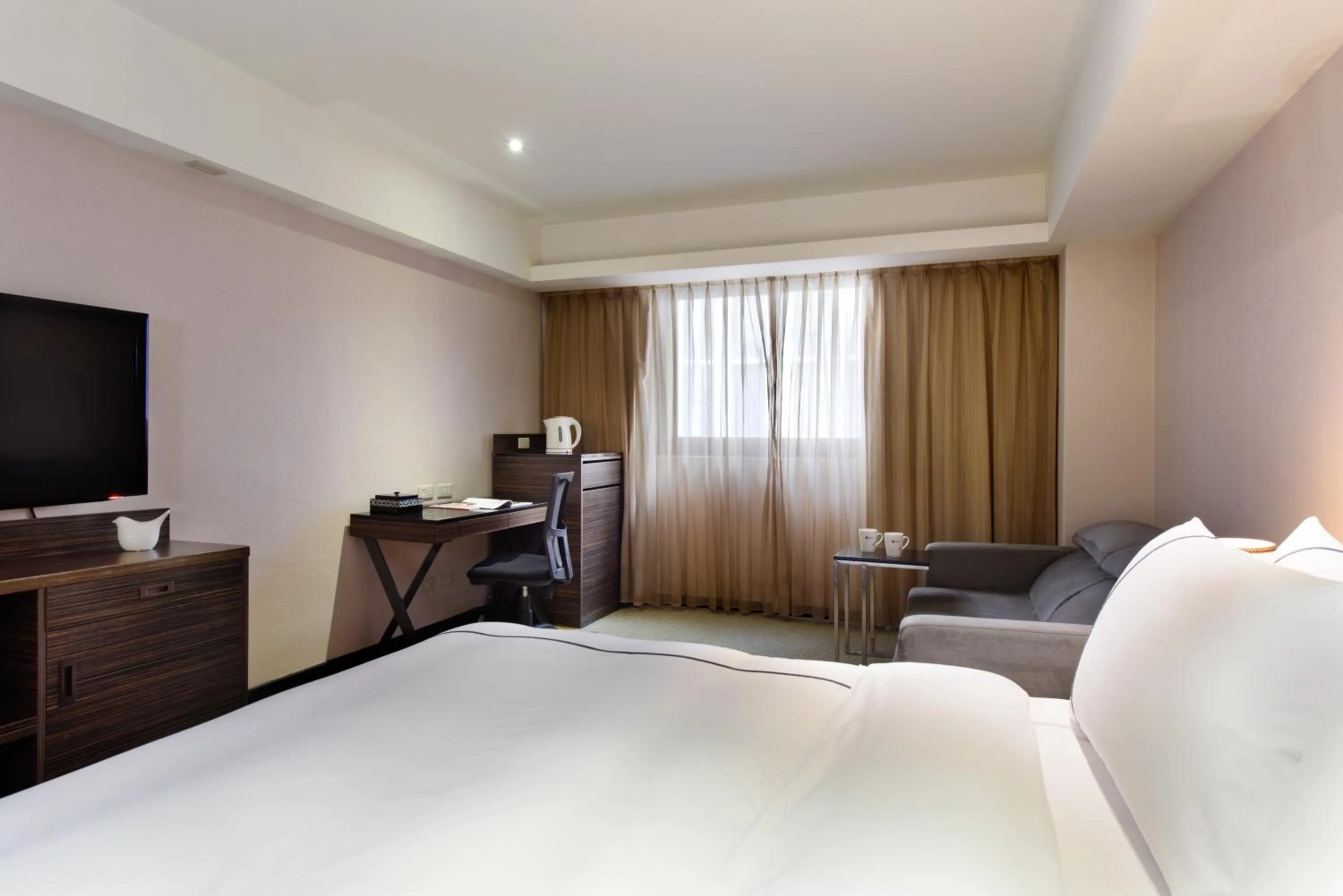 Bed in K Hotel Taipei