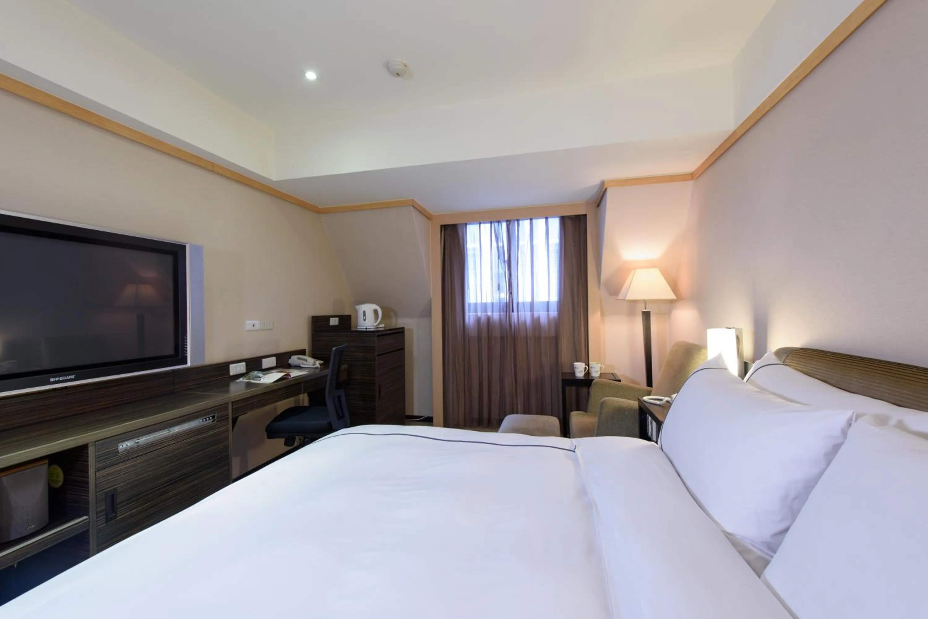 Bed in K Hotel Taipei