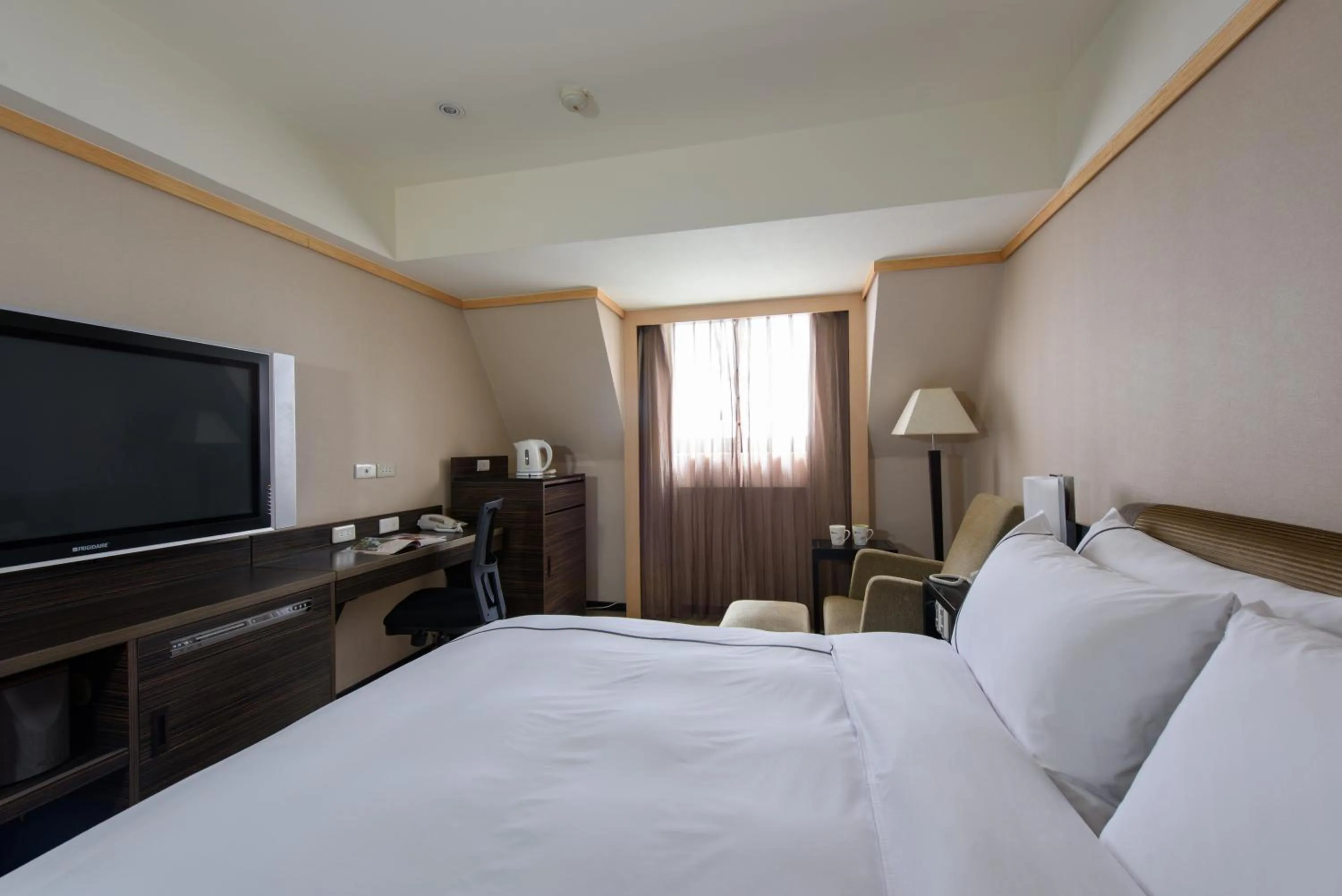 Bed in K Hotel Taipei