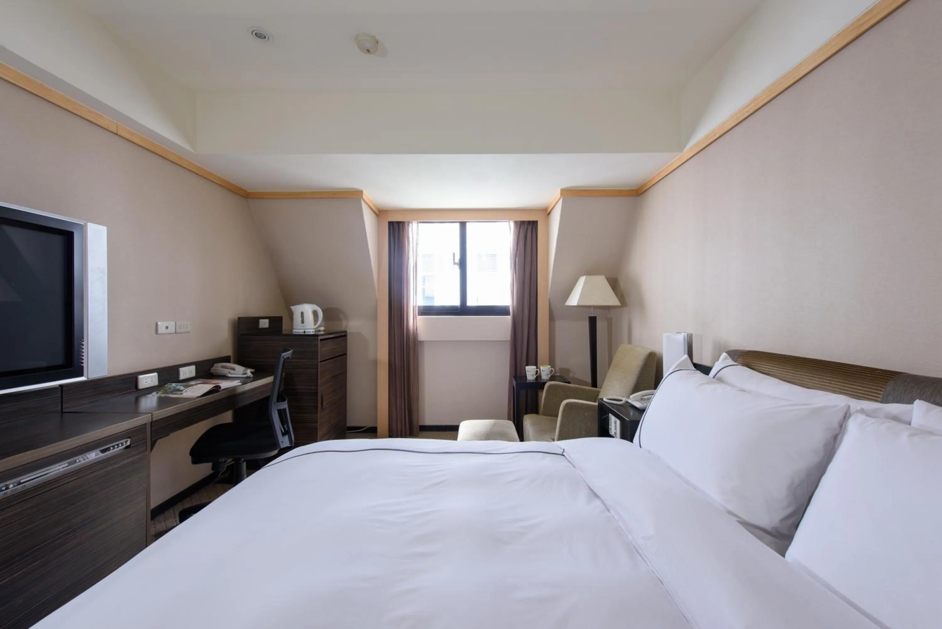 Bed in K Hotel Taipei