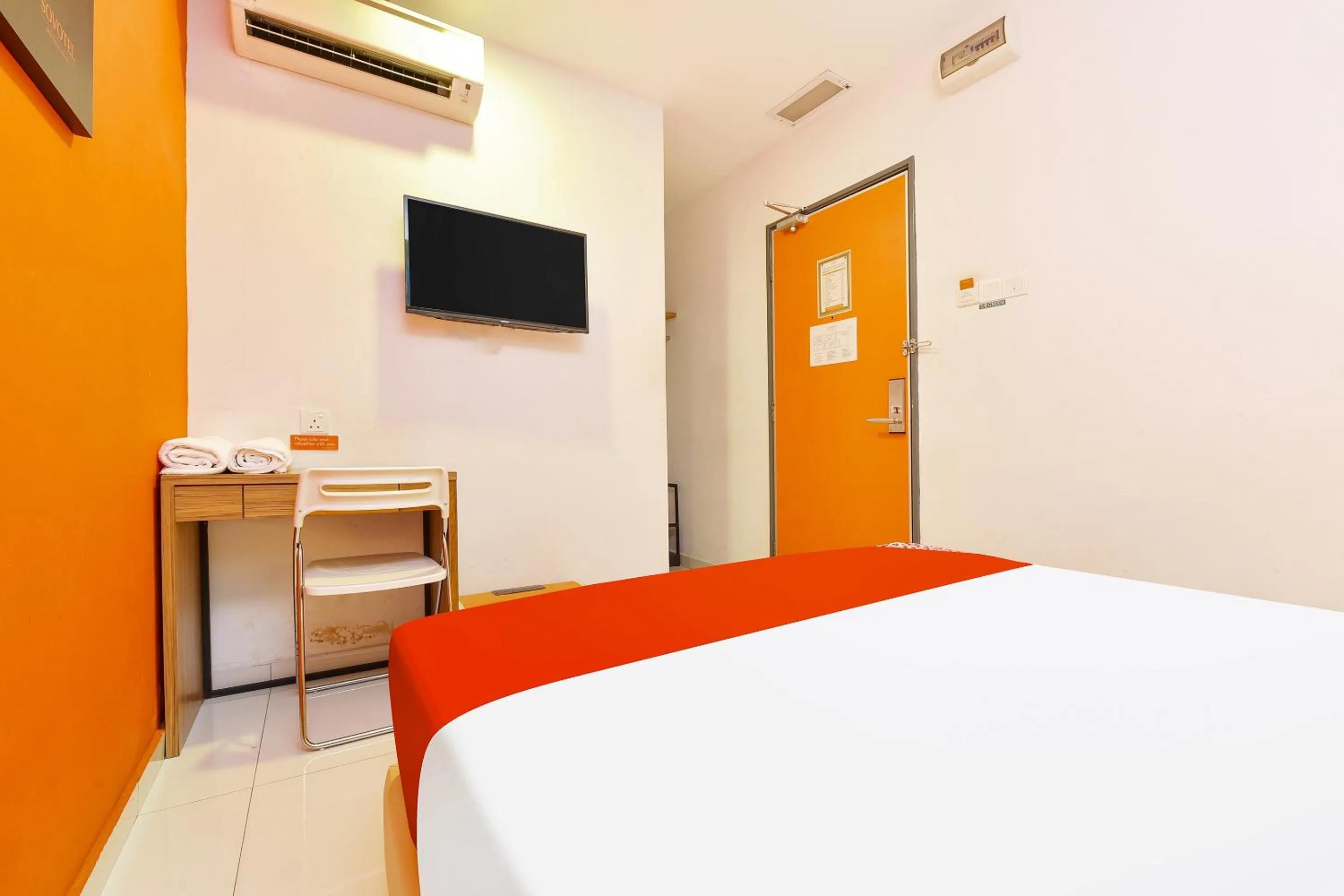 Bed, TV/Entertainment Center in Super OYO 90512 Sovotel Kelana Jaya 79