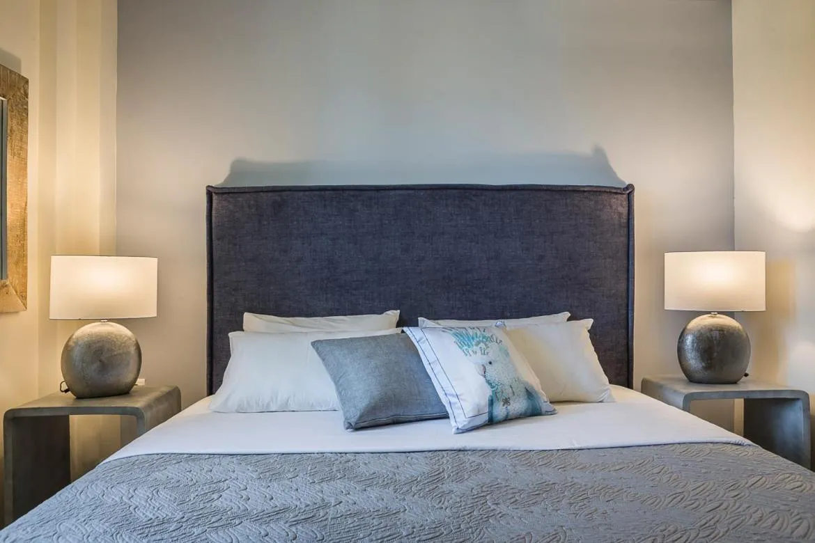 Bed in Meliti Waterfront Suites