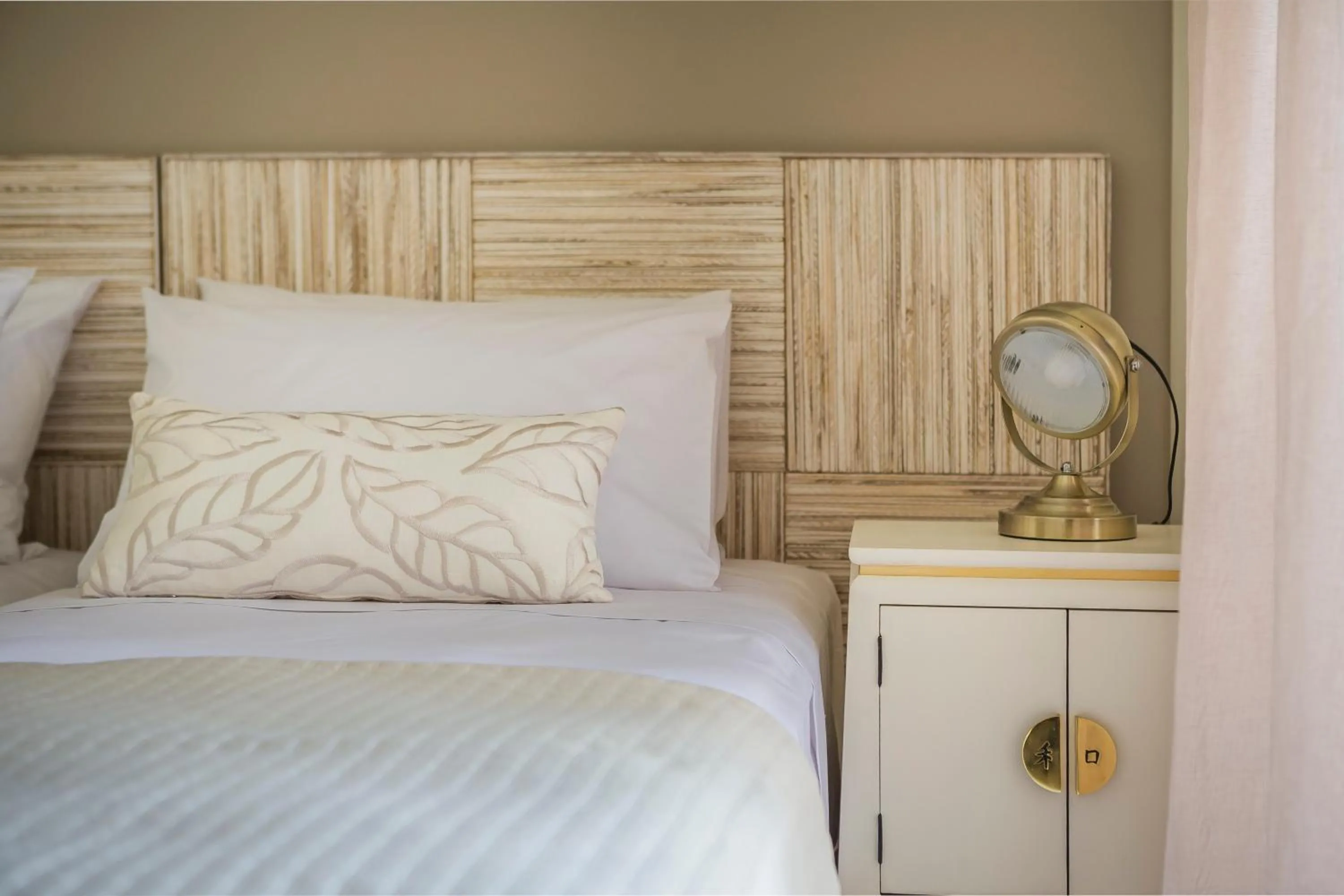 Bed in Meliti Waterfront Suites